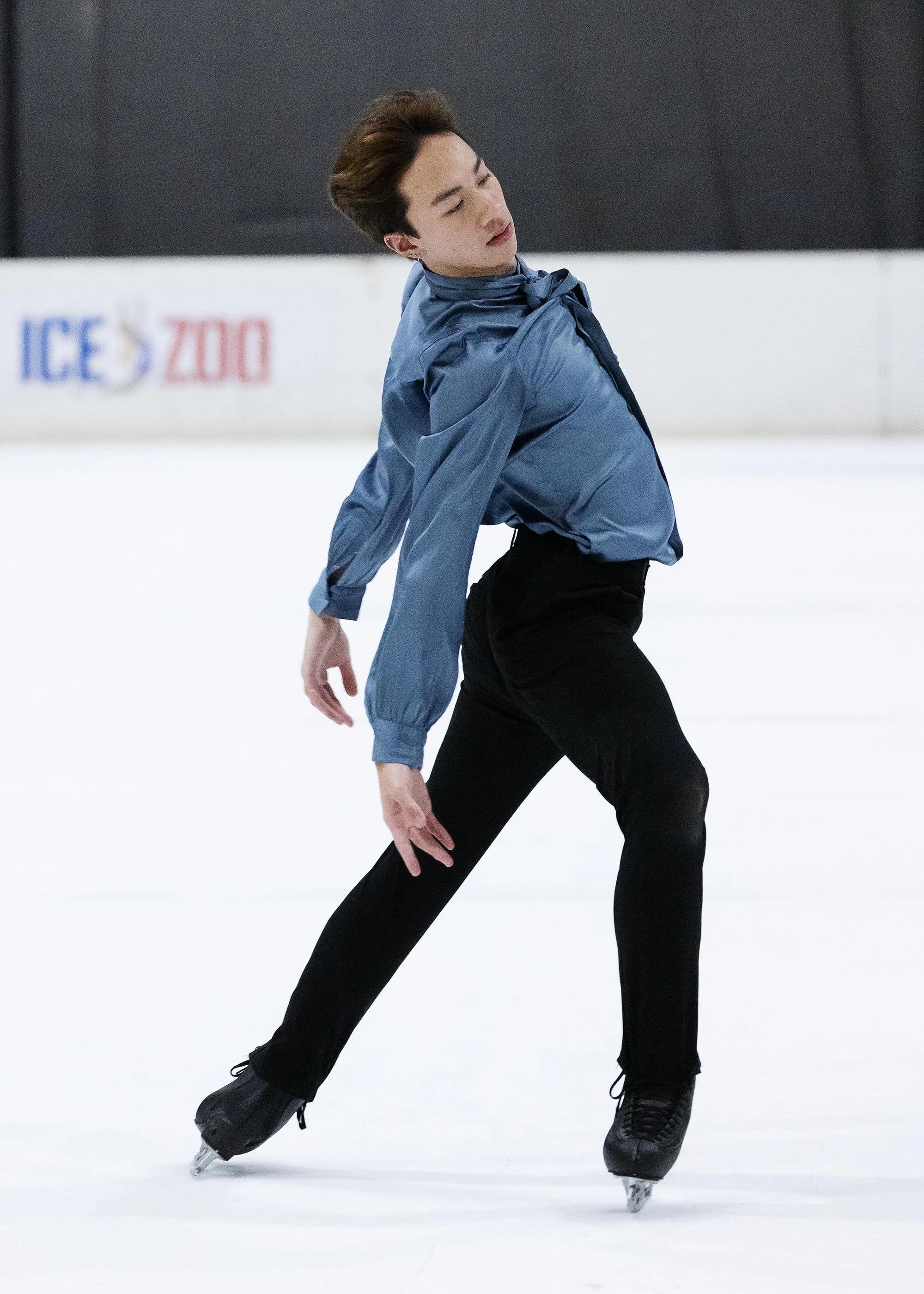 Emery Kaison performing an Ina Bauer on the ice from the Daily Telegraph.