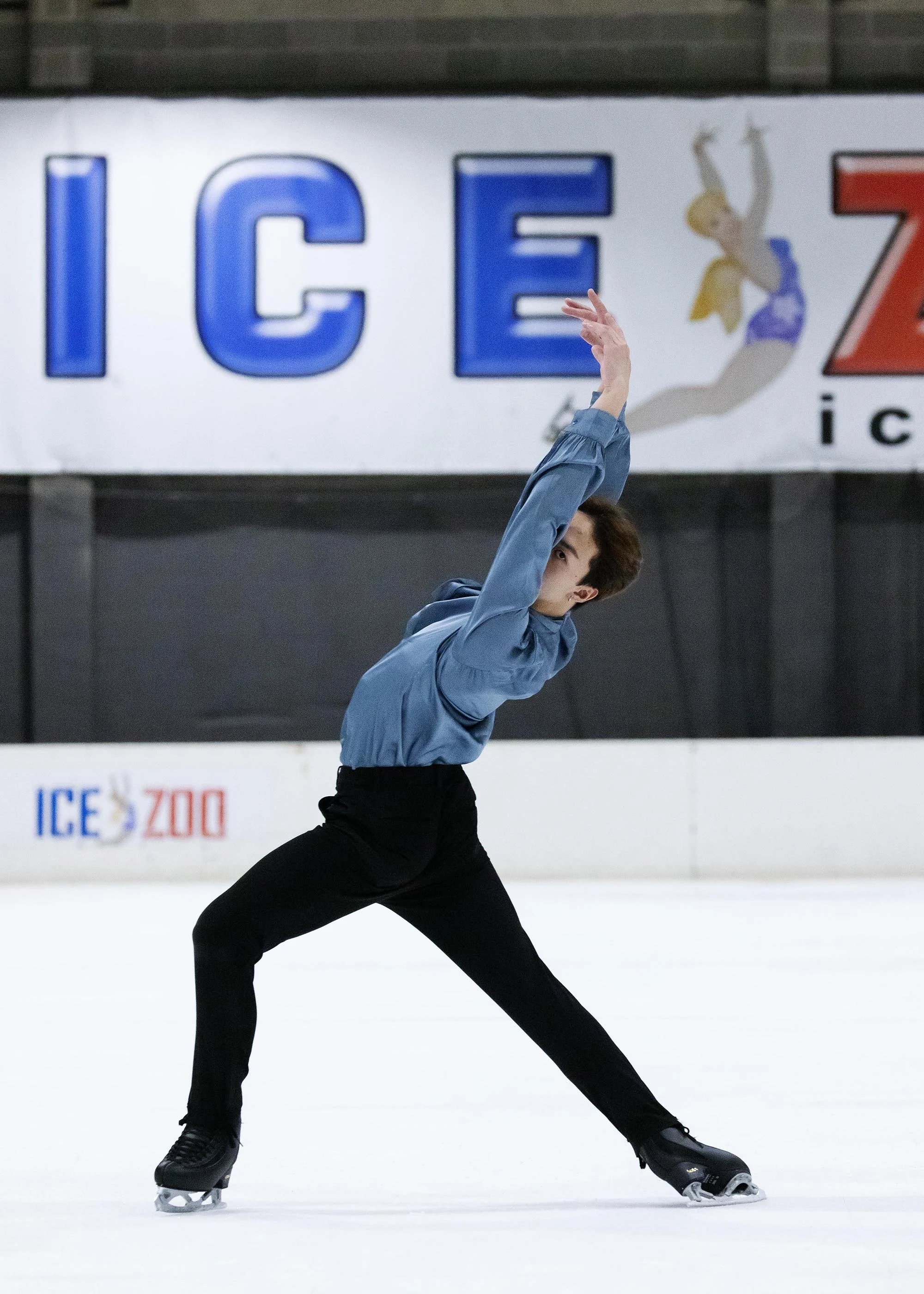 Emery Kaison performing an Ina Bauer on the ice from the Daily Telegraph.