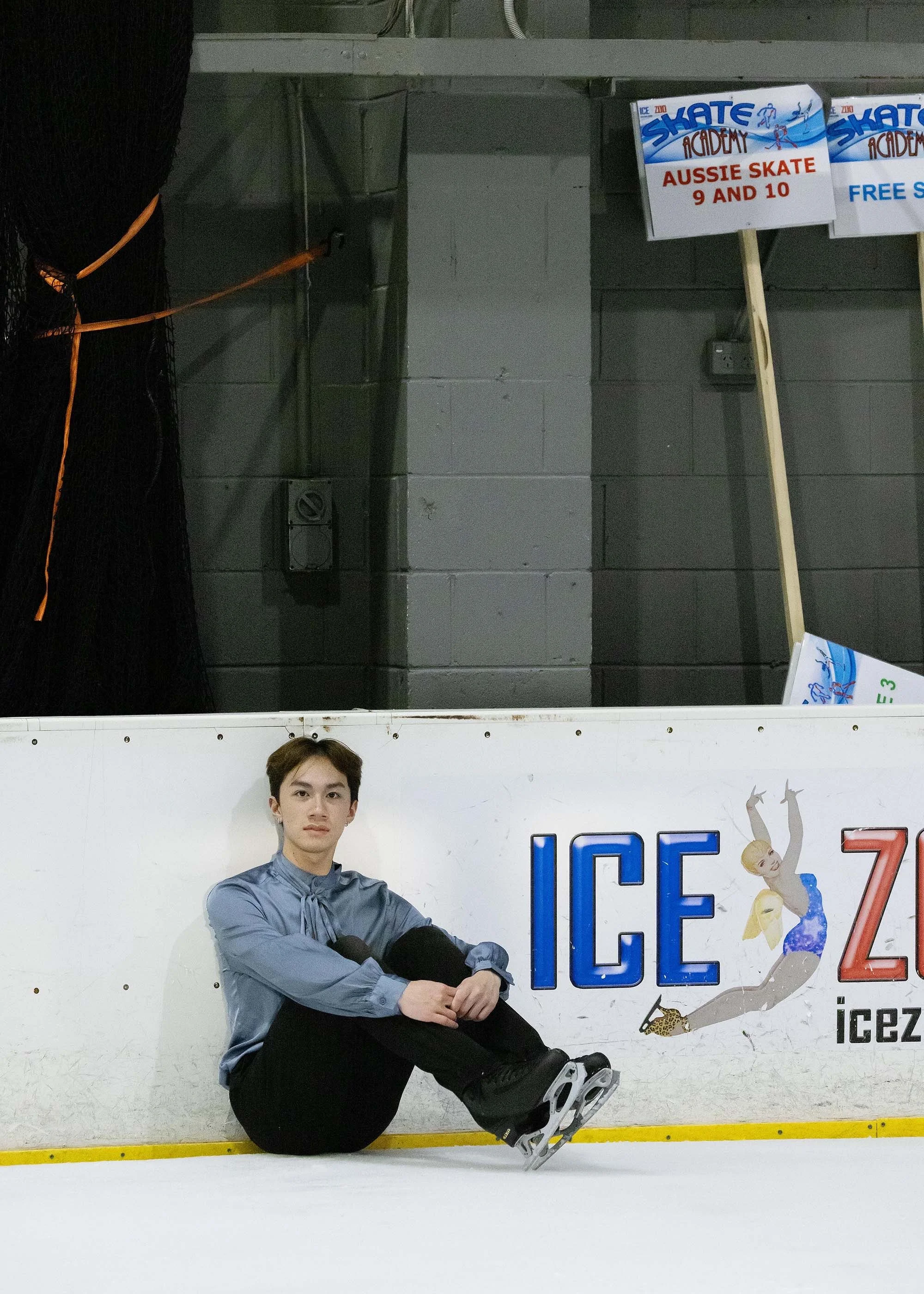 Emery Kaison sitting on the ice from the Daily Telegraph.