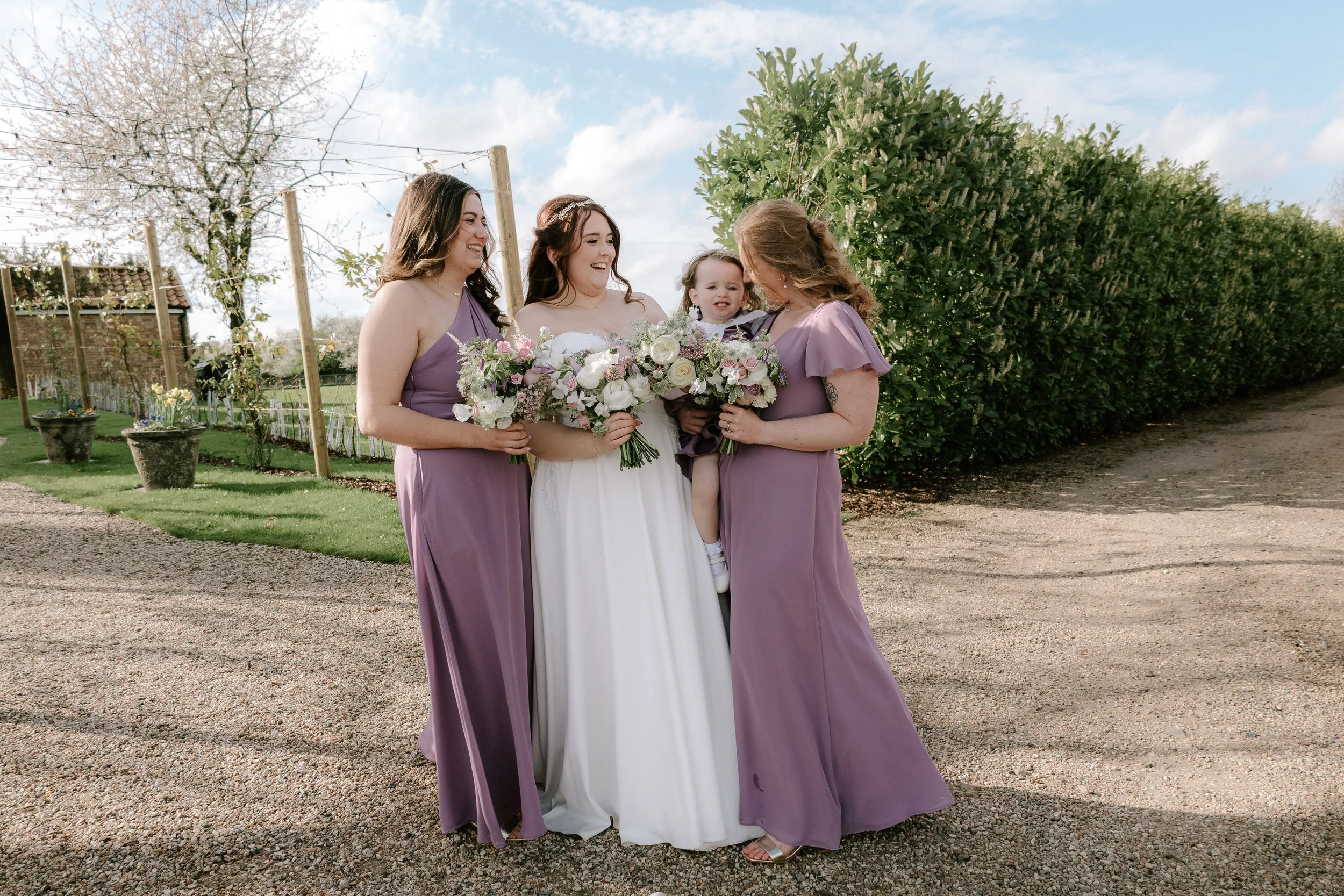 copdock-hall-wedding-bridesmaids-laughing-candid.jpg