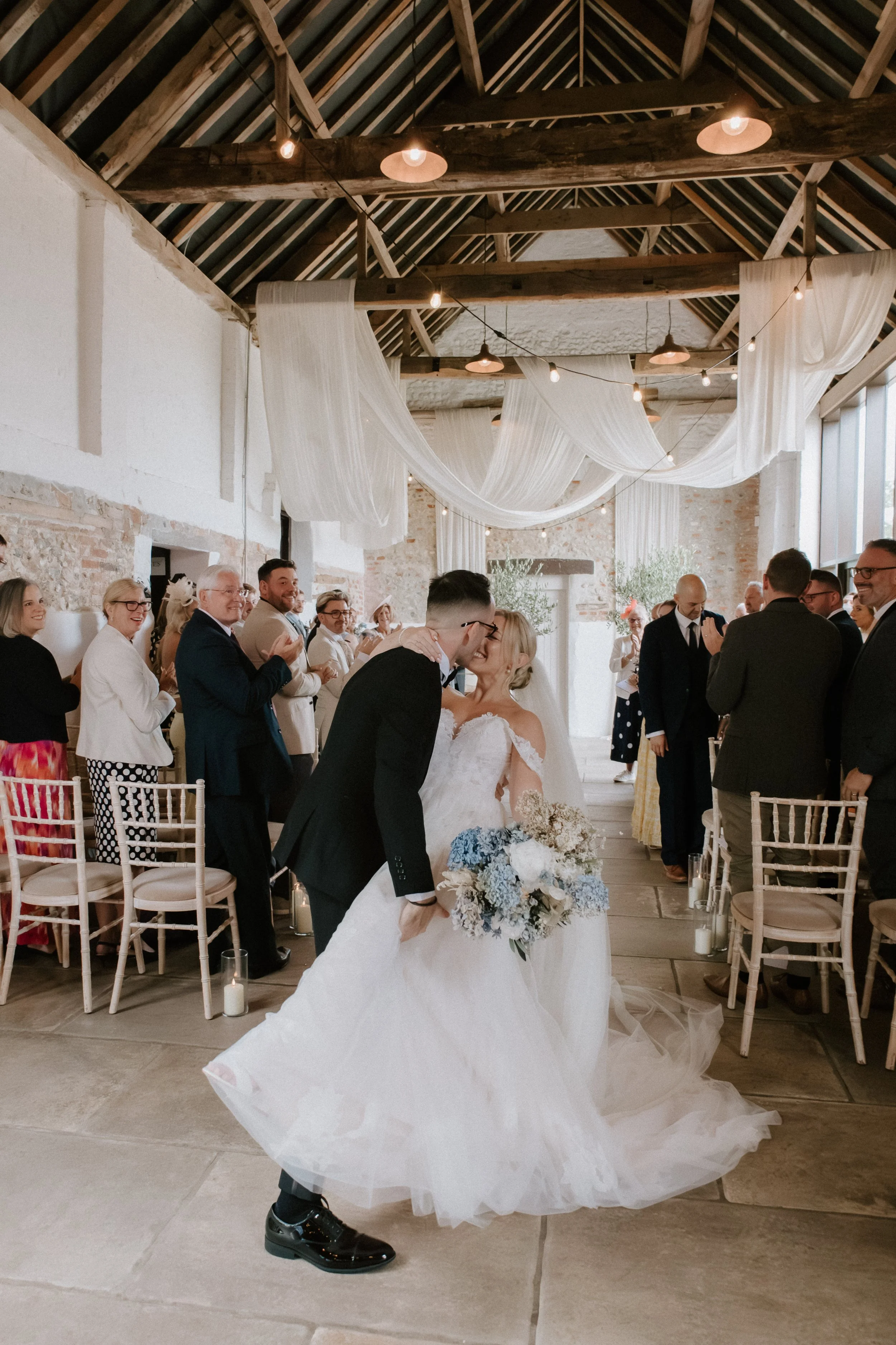 Documentary wedding photography at a countryside wedding in Norfolk Curds Hall Barn
