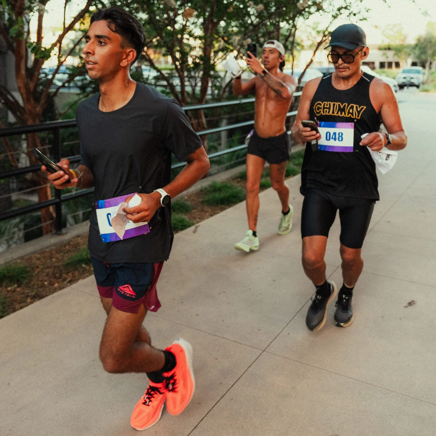 Three Shadow Strike runners head to the next checkpoint in Brea, CA.