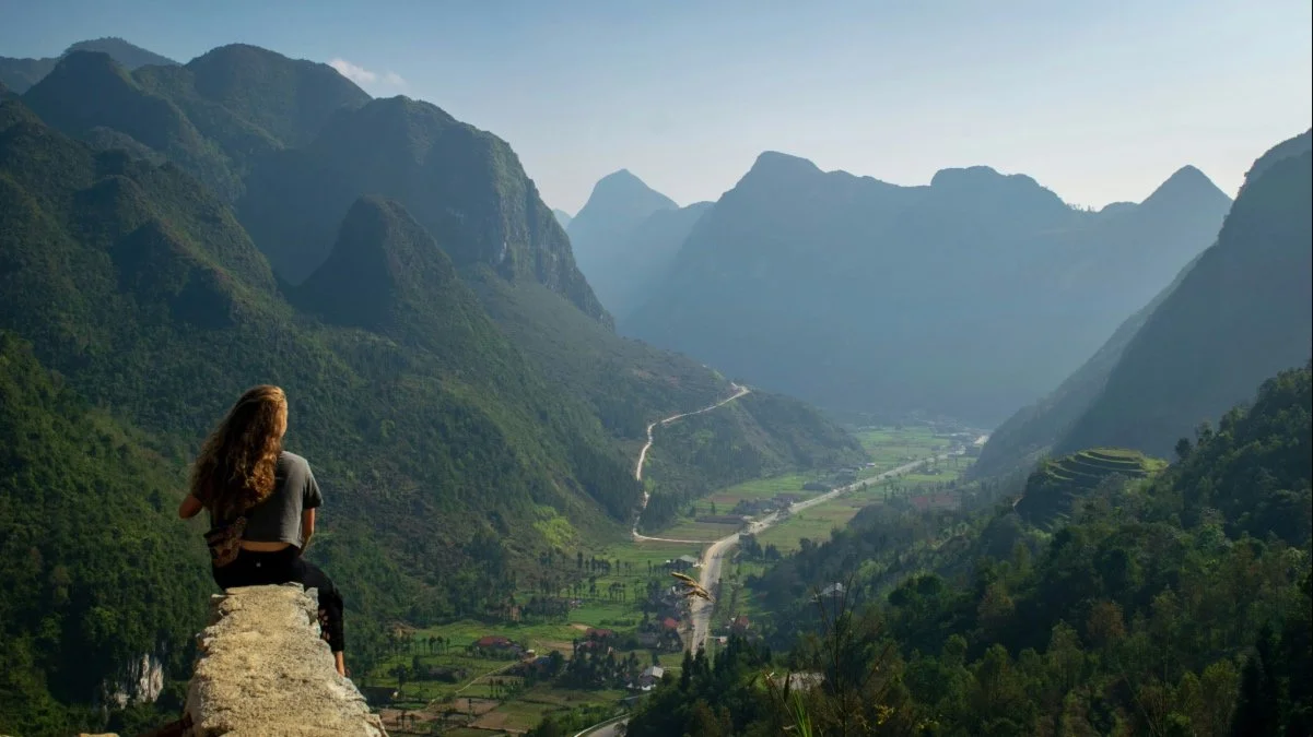 A missionary sitting alone in quiet reflection, representing the hidden emotional weight carried by global workers