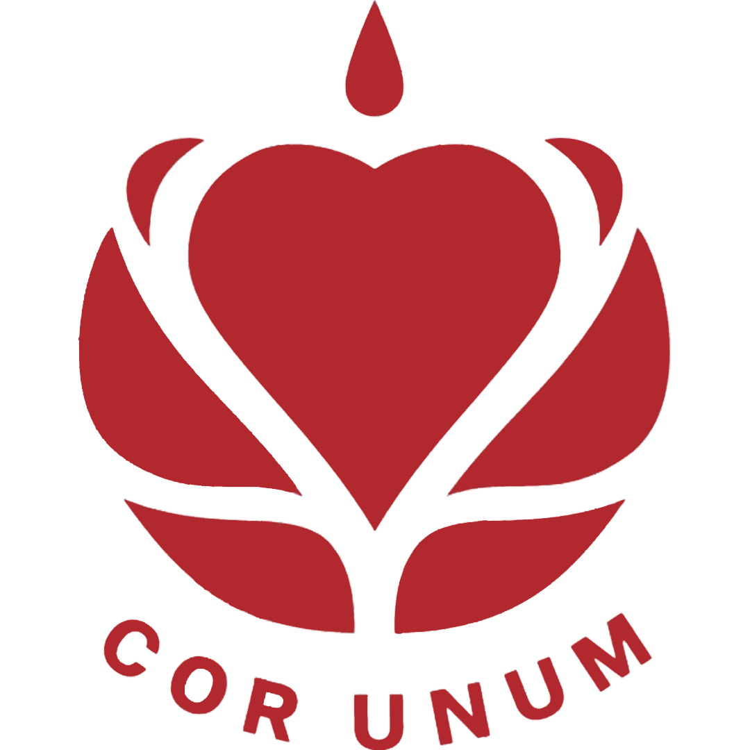 A stylized red heart enclosed by a red rose with a single droplet above, and the text "COR UNUM" beneath.