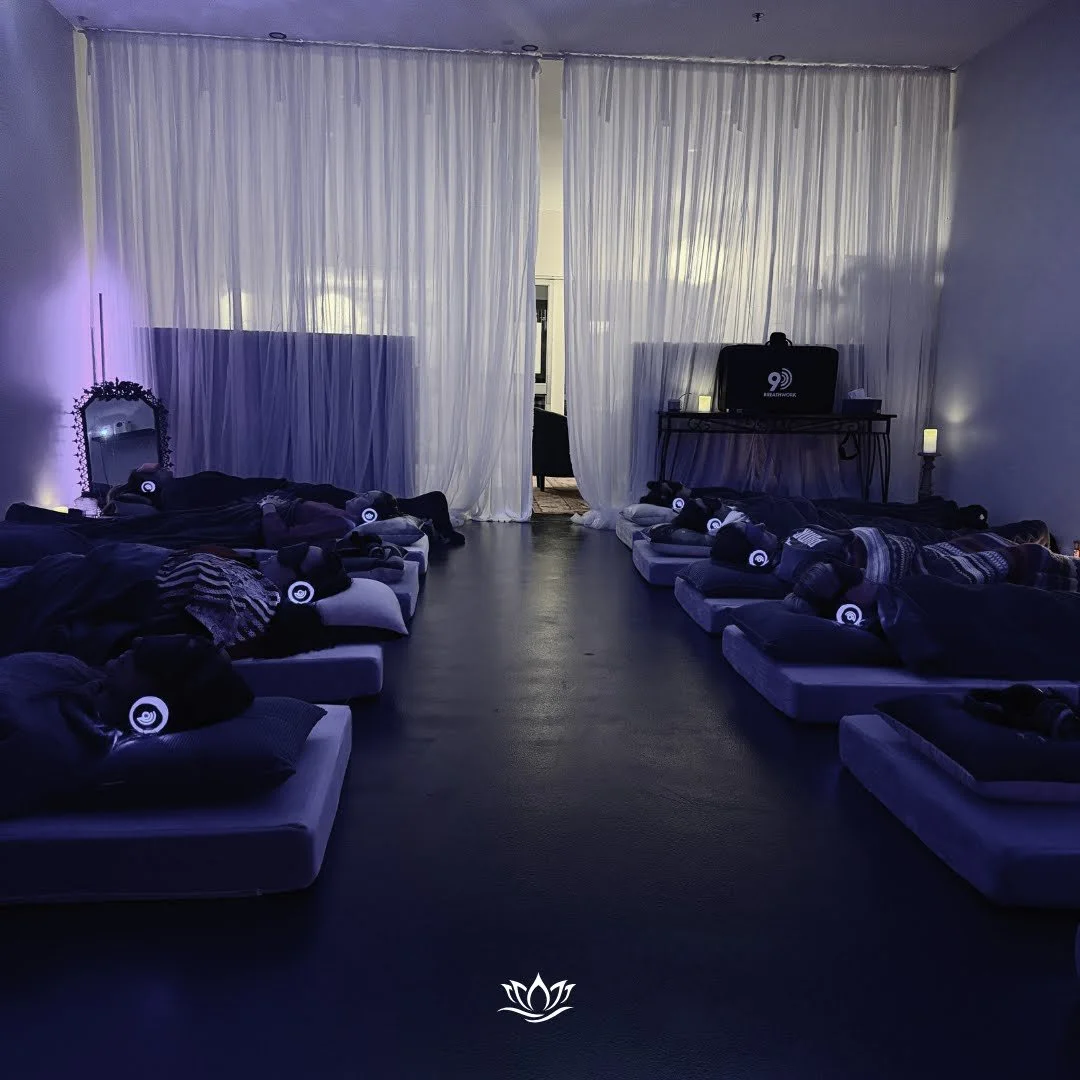 A roon full of 9D sesson customers experiencing breathwork in one of our groups sessions