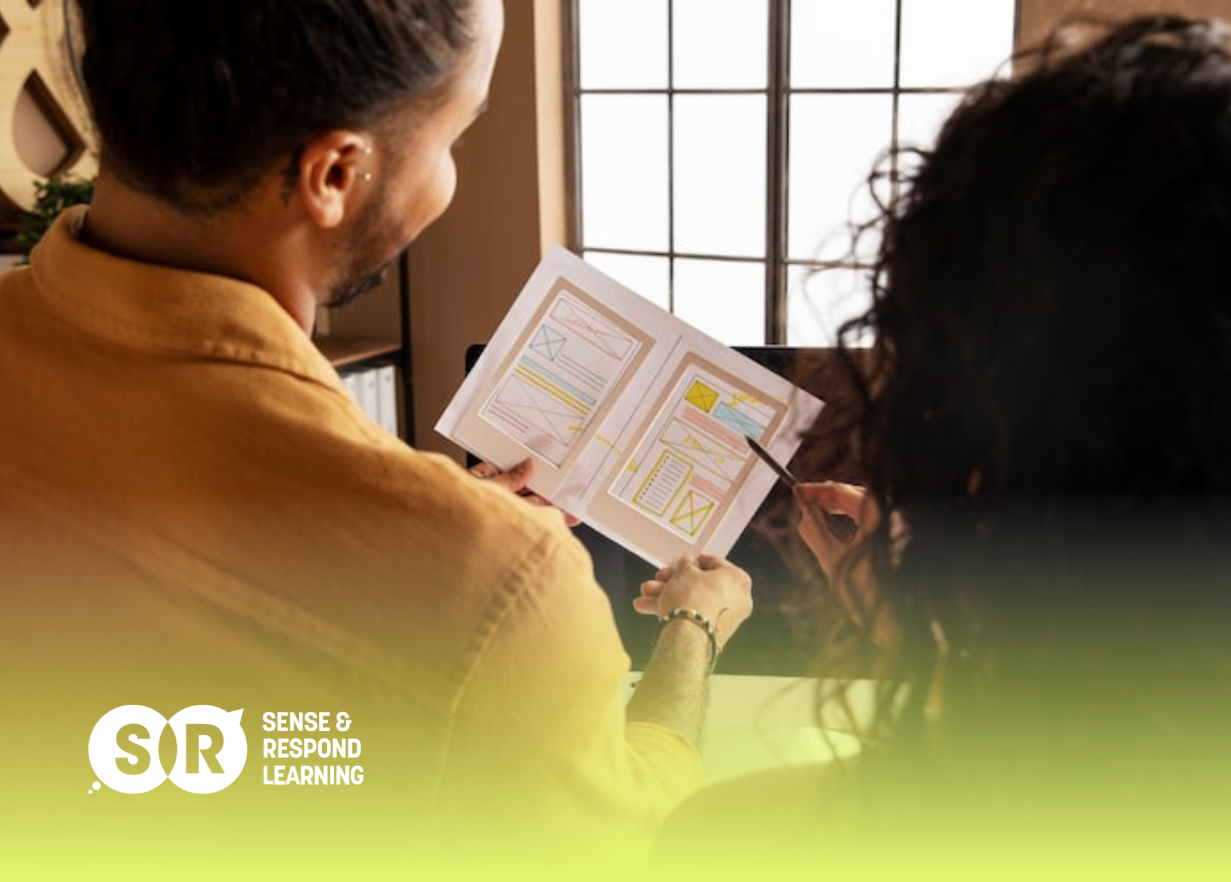 Team member taking notes during a user research observation session