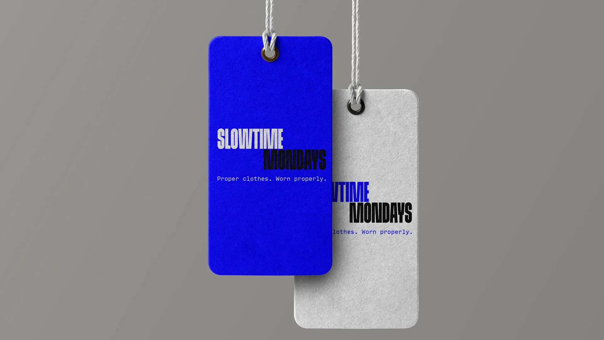 Open magazine featuring images of modern interior design, including a lighting setup with linear LED lights on a wooden ceiling and a digital clock display on a smartwatch.