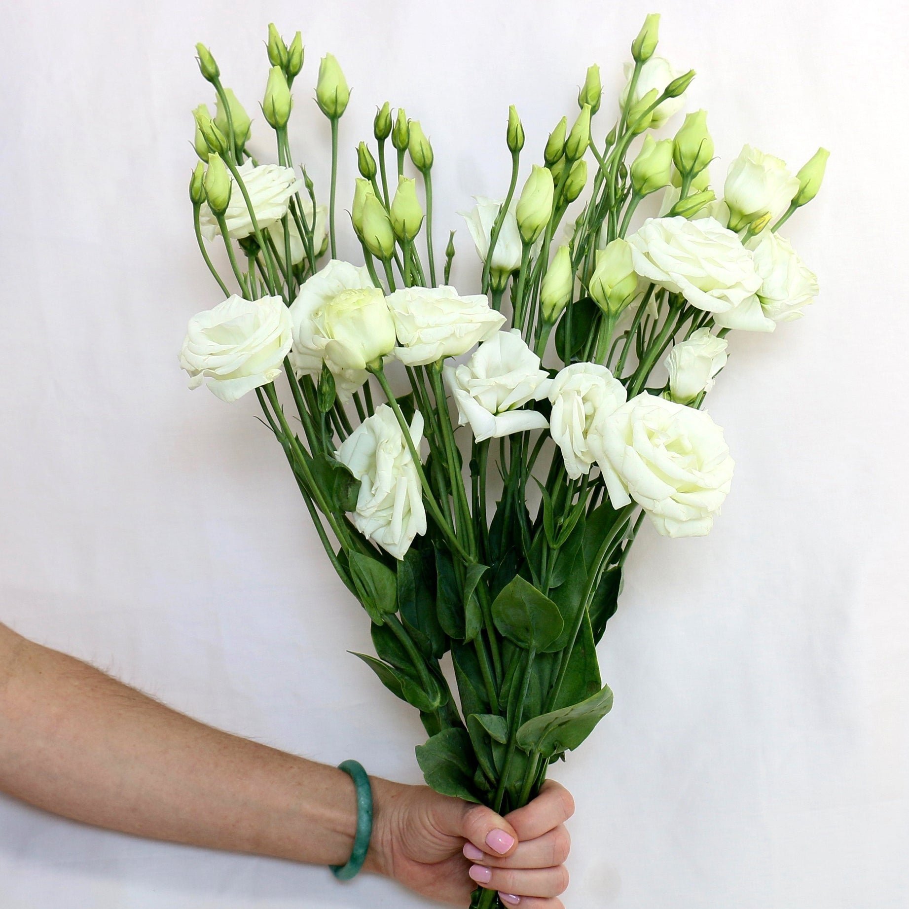 lisianthus_bunch_with_hand_with_logo_e9d11cbb-5a5d-4743-b906-91482ee23f44_2048x.jpg