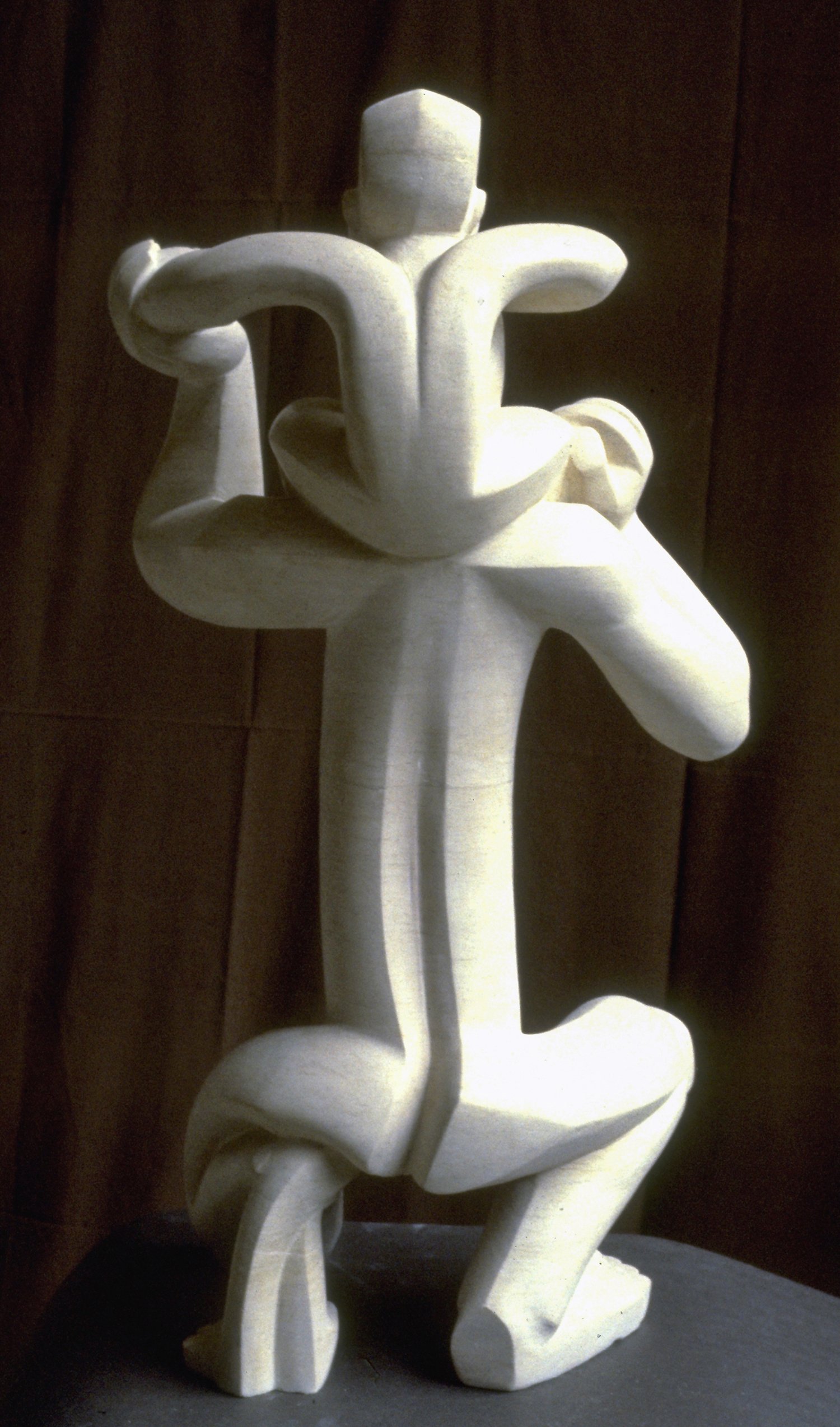 Kneeling, Holding, Protecting II. Ancaster Stone. 40' high. 1981.