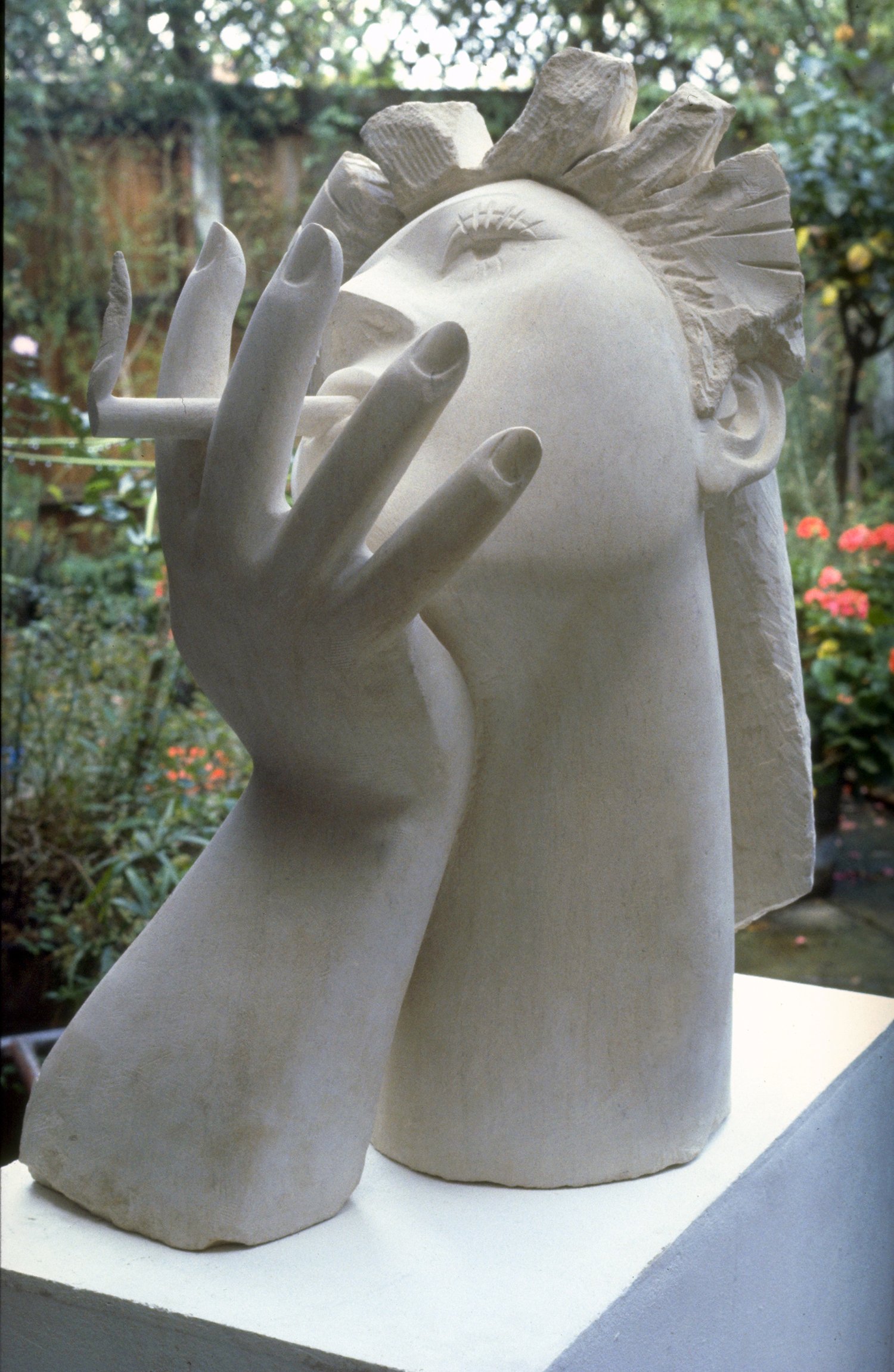 Woman with Cigarette. Ancaster Stone. 34' high. 1983. Private Collection.