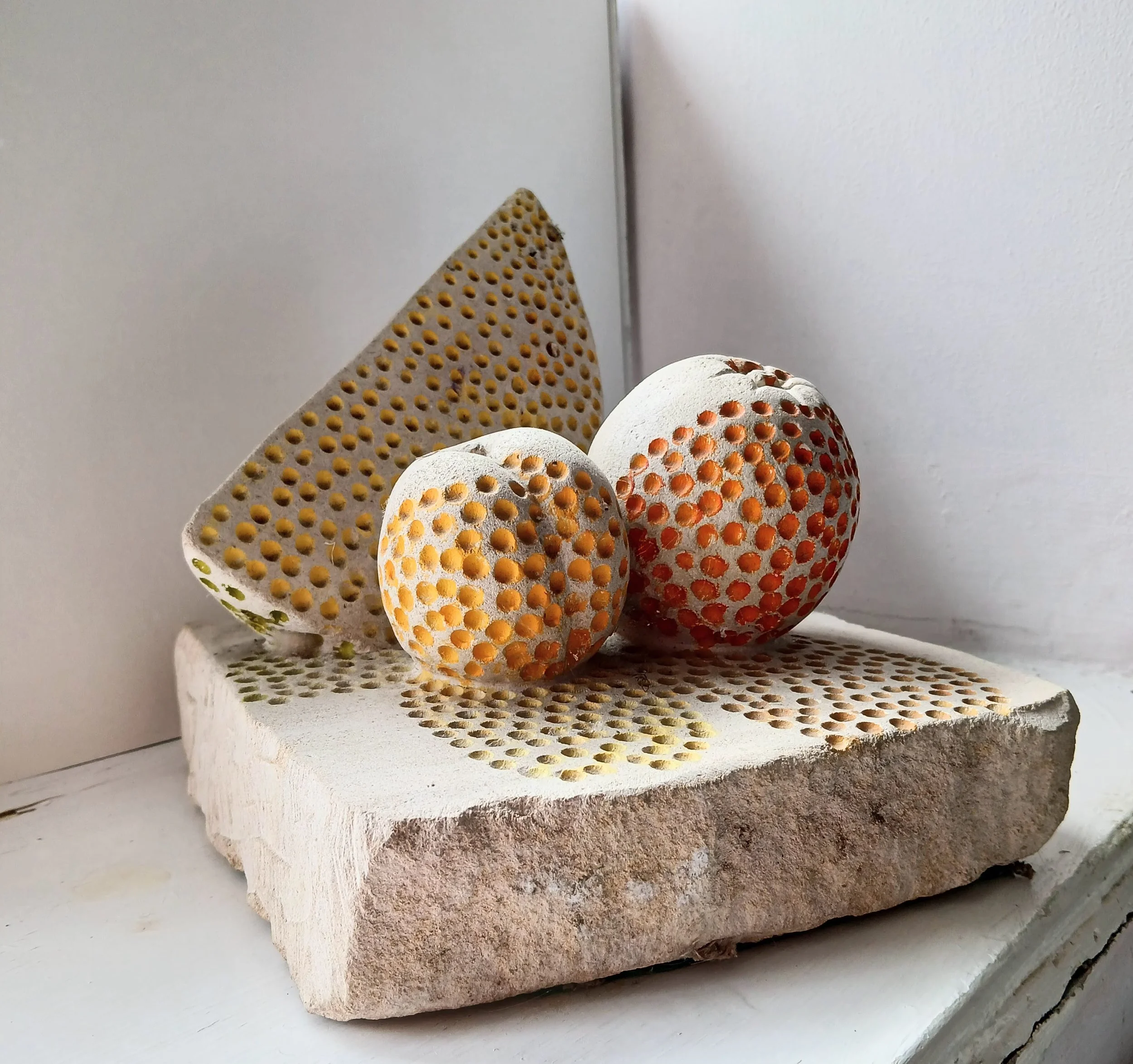 Summer Fruits with Shadows II. Ancaster Stone & paint. 12' long x 10' high. 2002