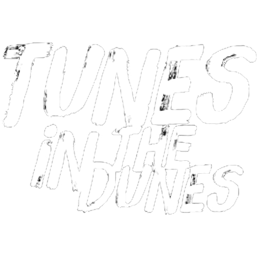 Stylized white text on black background reads 'Tunes in the Dunes' in a bold, dynamic font.