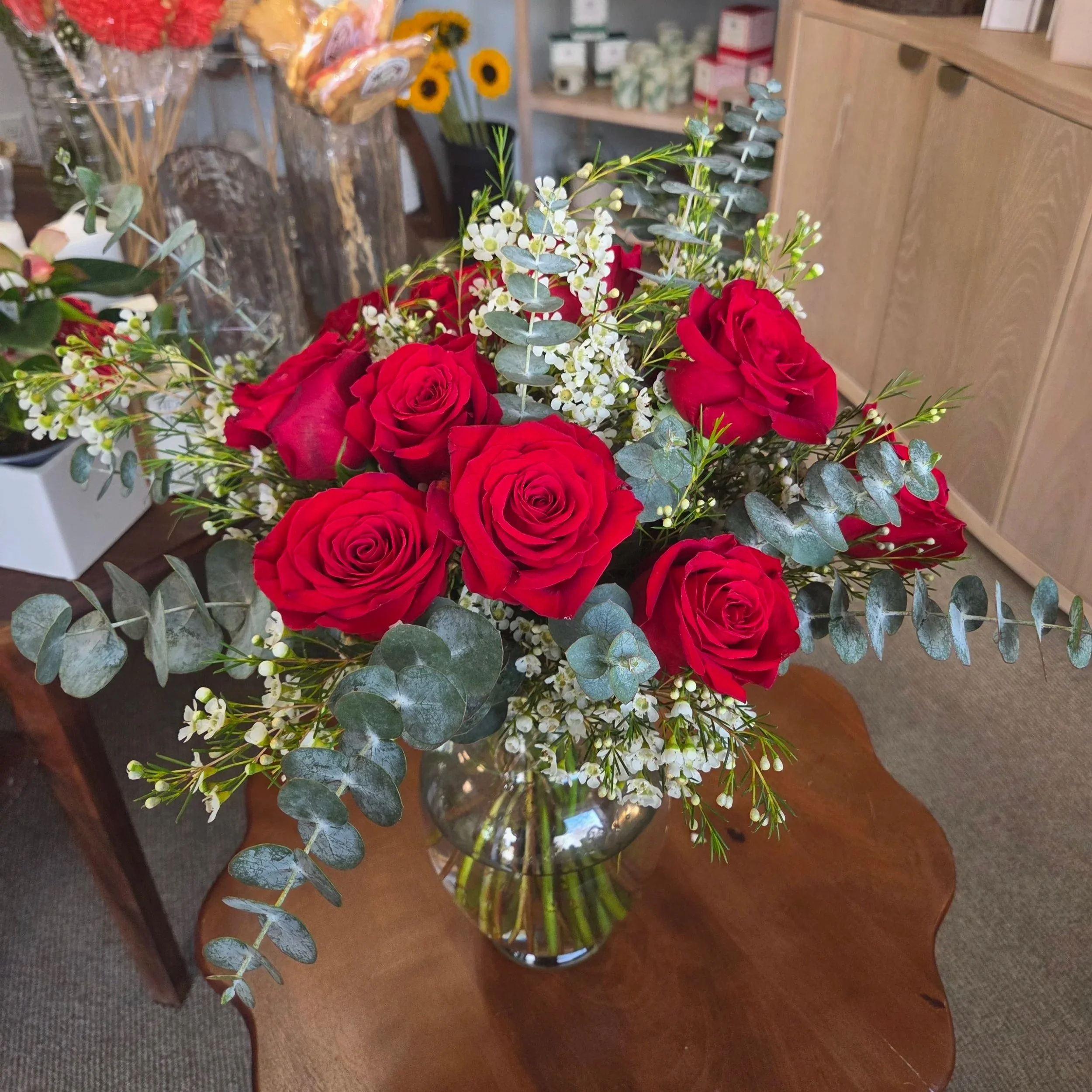 A bespoke, hand-tailored classic premium red rose arrangement by Quogue Flower Shop, perfect for your loved ones, Valentine's Day or a last-minute meaningful gift with same-day flower delivery across the Hamptons.