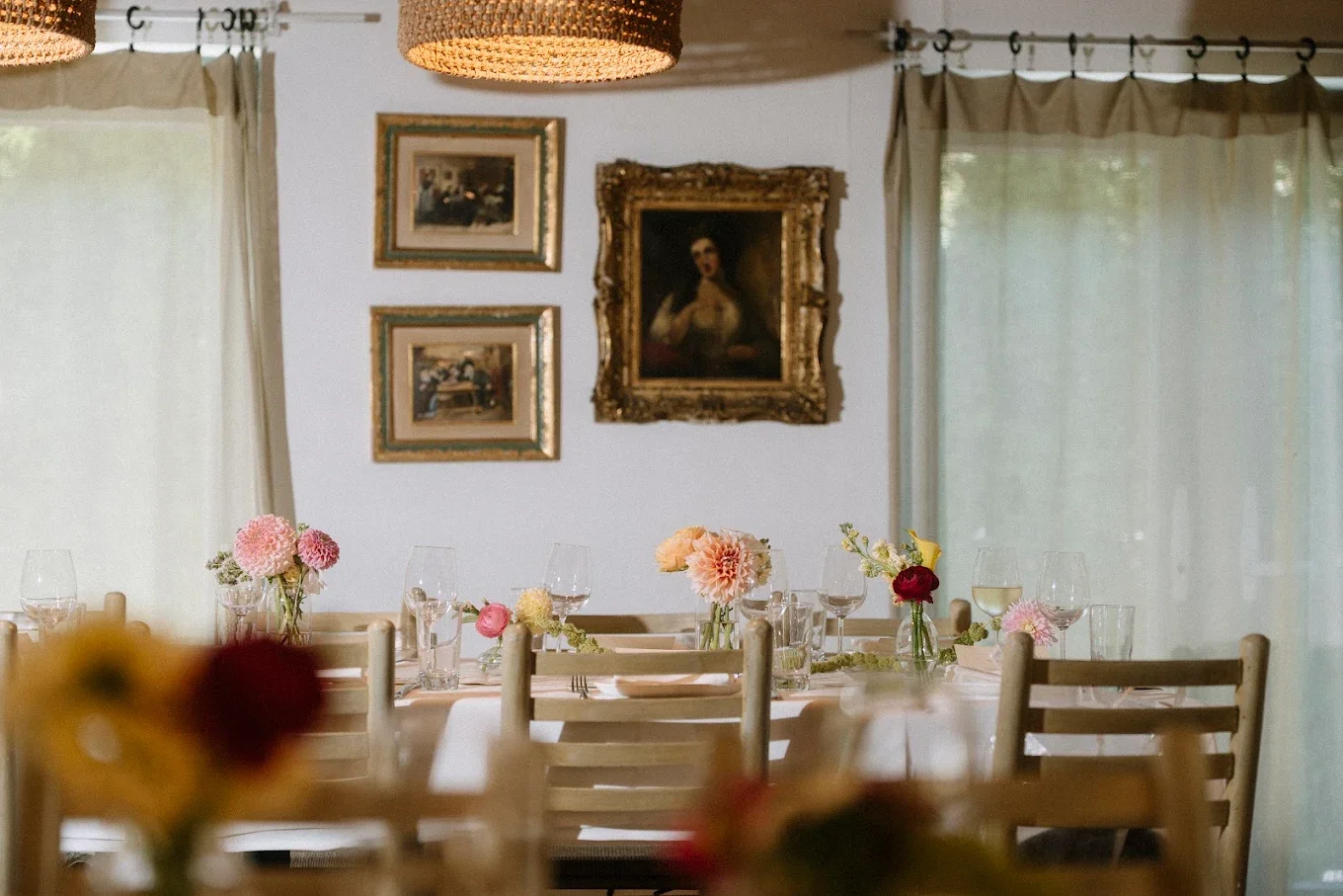 Elegant, low-profile bud vase centerpieces by Quogue Flower Shop, perfect for high-end rehearsal dinners, intimate bridal showers, and luxury private home entertaining across the South Fork.