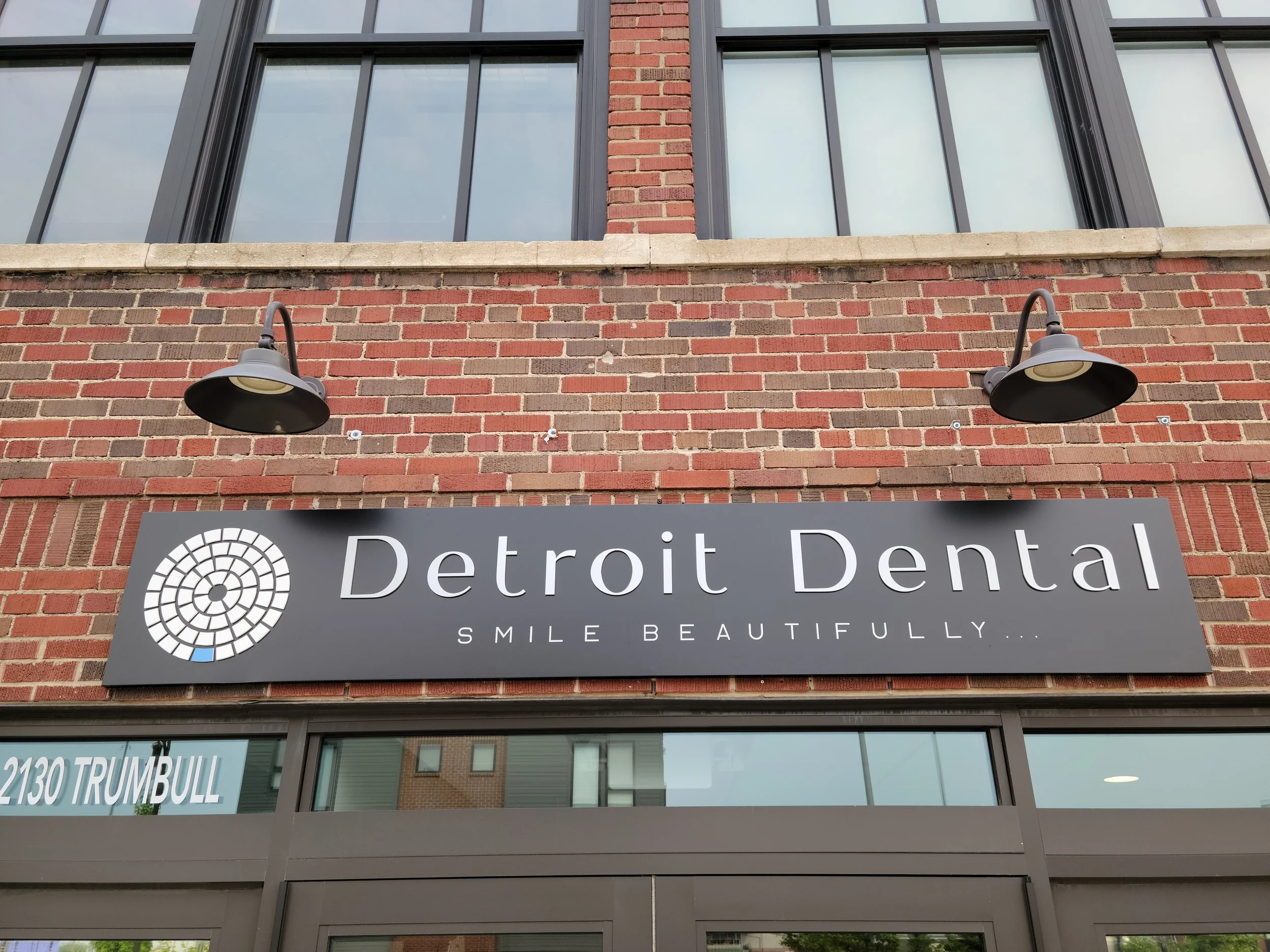Detroit Dental Spa sign at 2130 Trumbull Street in the Checker Cab building.