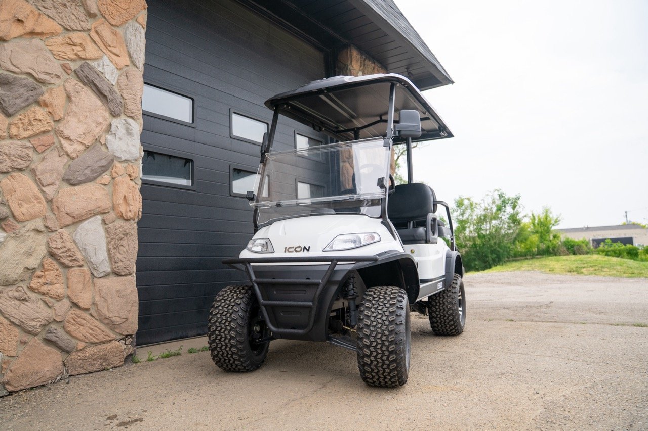 White 2025 Icon i40L Eco golf cart.