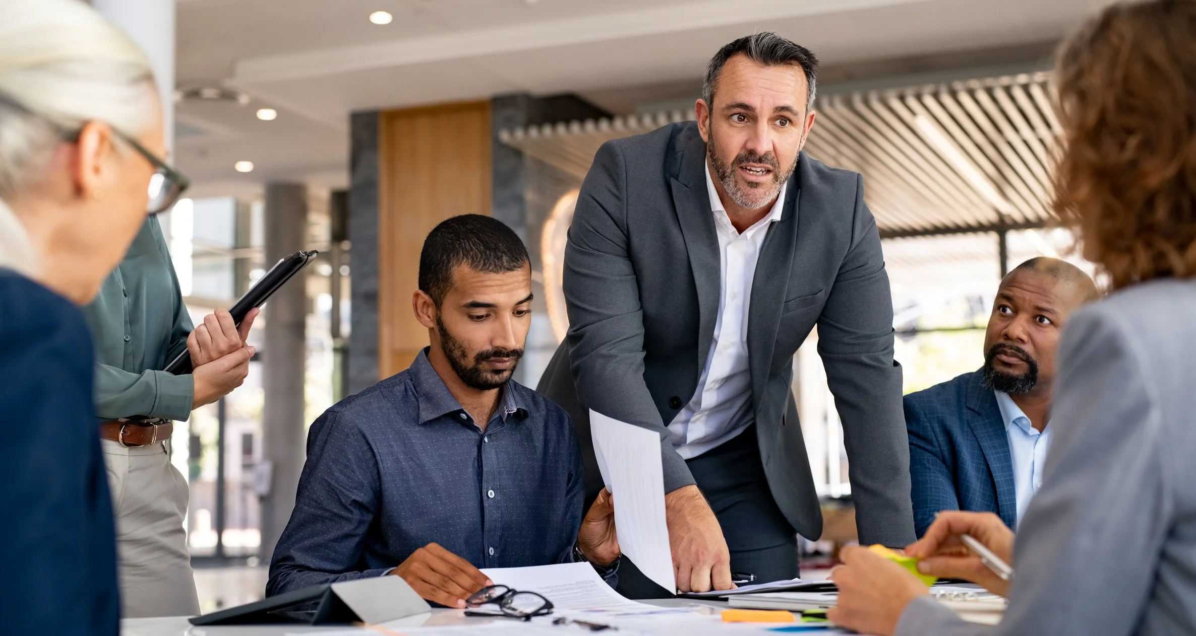 Male executives in STEM at a conference table