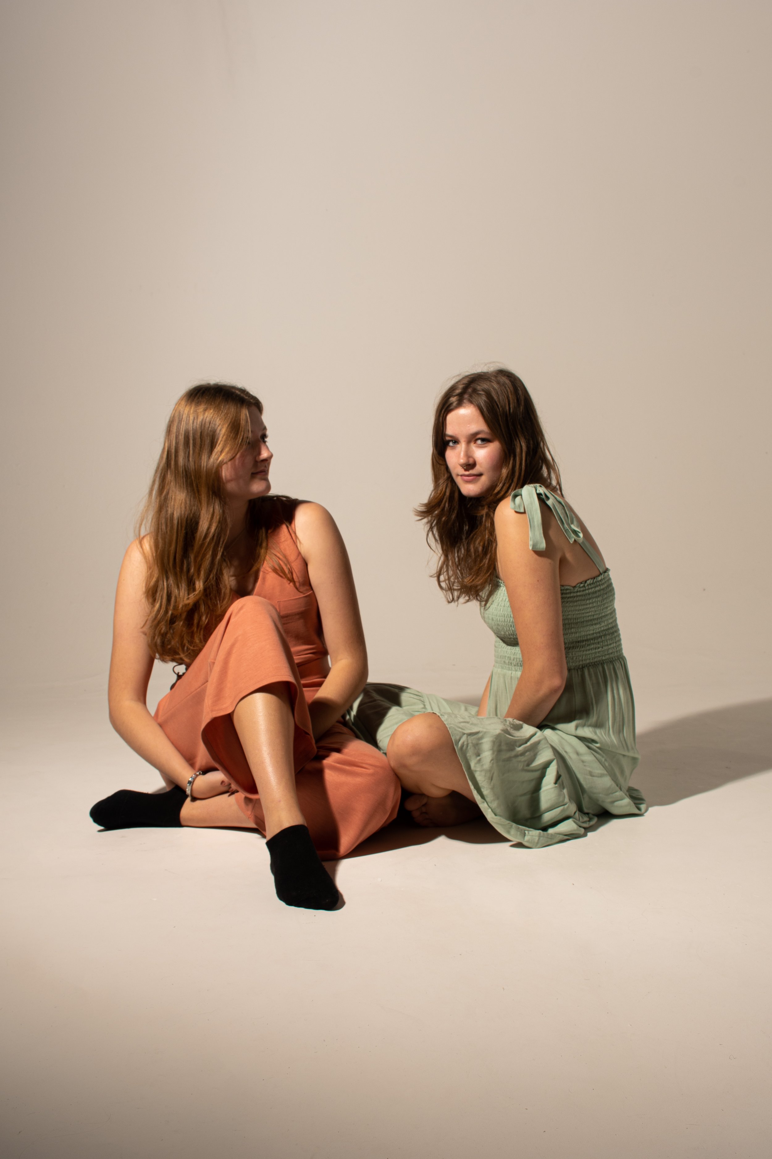 Two sisters depicting their 'Family' love together