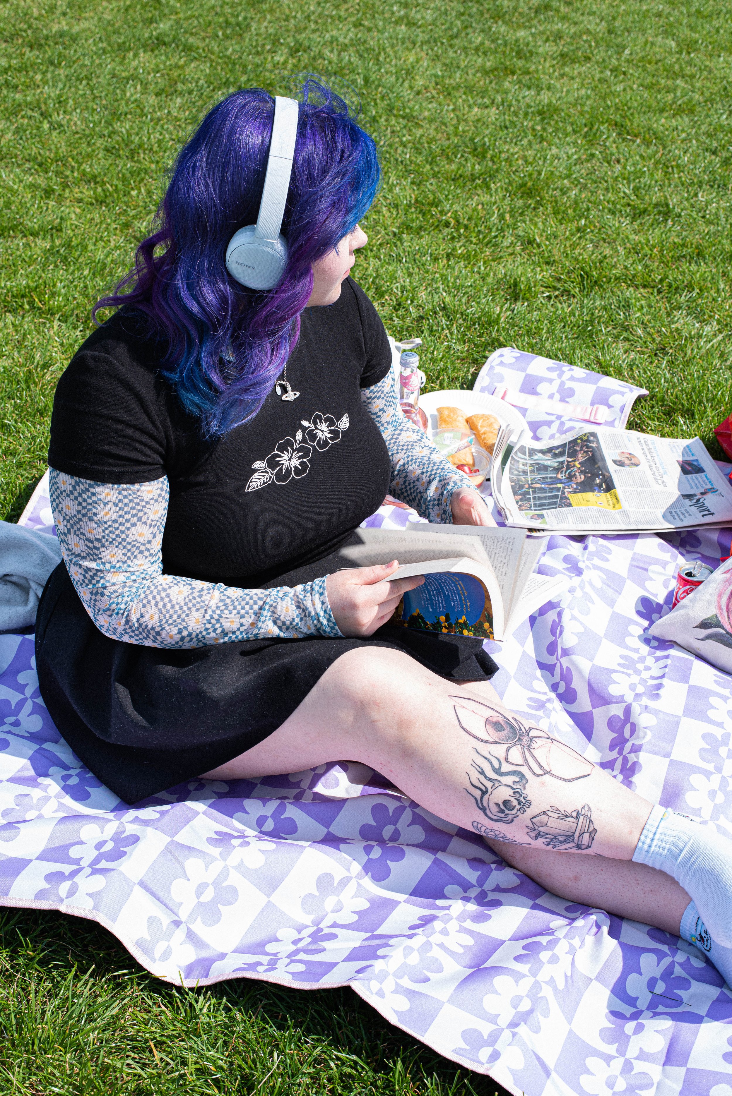 80's grunge fashion worn by my model, surrounded by snacks and a newspaper.