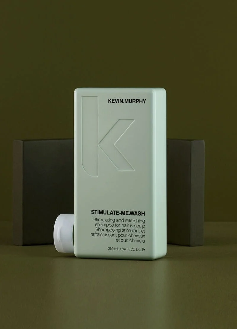 a green shampoo bottle from kevin murphy