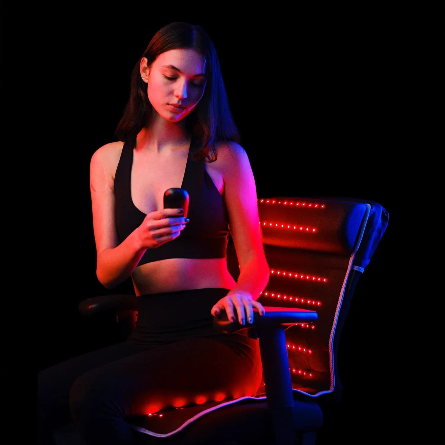 best red light therapy mat for cellular health women on chair with red light mat