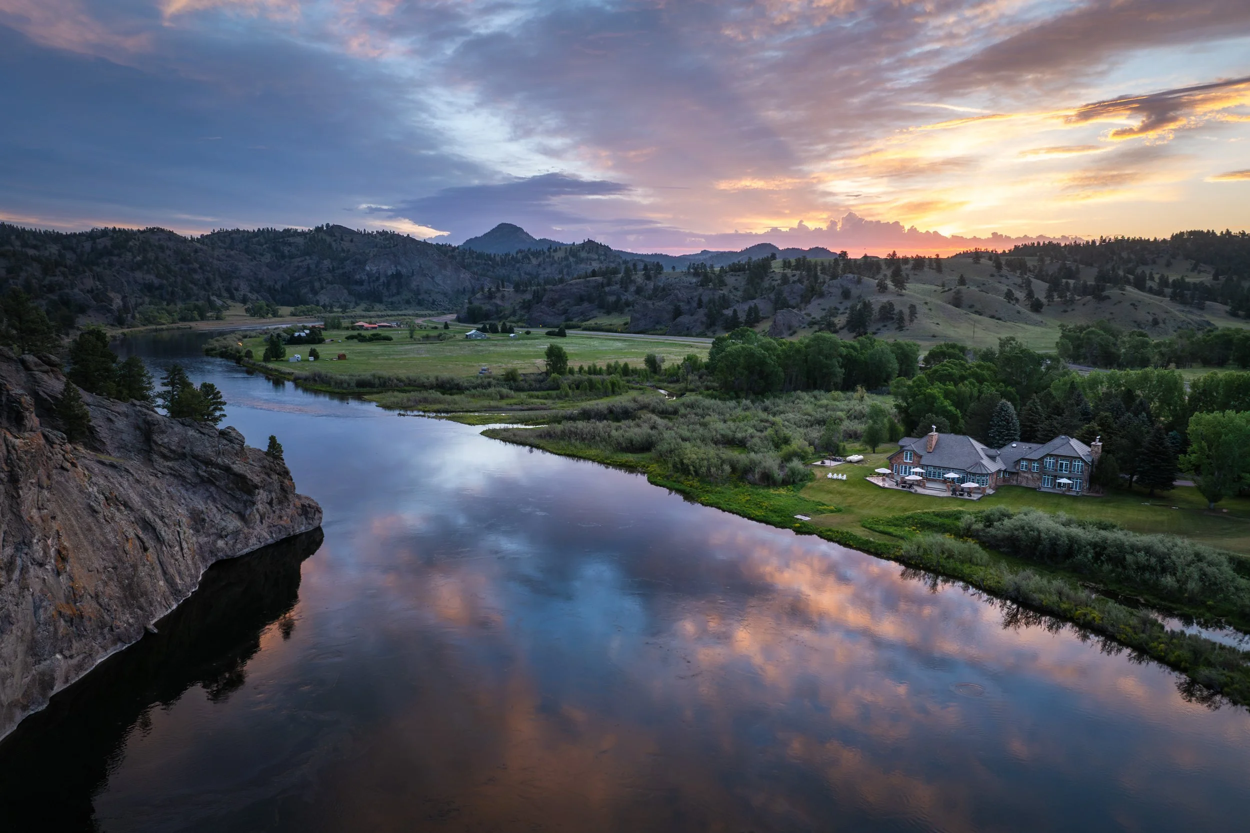Aerial view of Rivenrock Lodge on the Missouri River at sunrise
