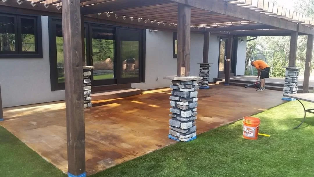 Custom Acid-Washed Concrete Patio with Rich Natural Tones