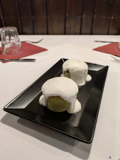 Tortino di porri su fonduta di Parmigiano Reggiano