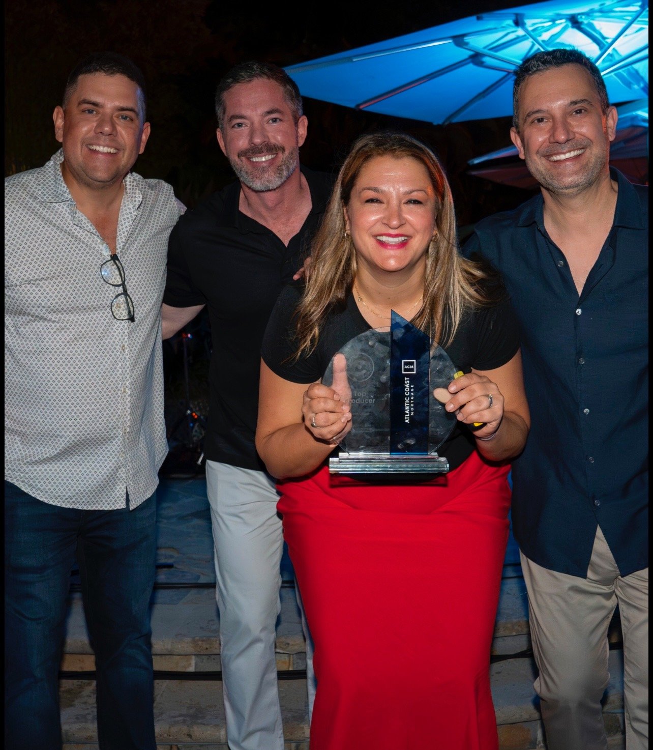 Caryn Grafton and team receiving an award