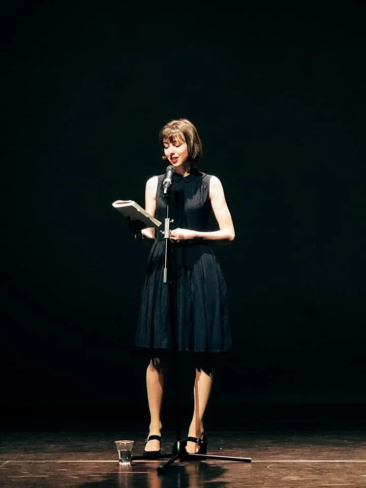 Georgia Preece stood on stage at Lincoln Art Centre performing poetry as part of a fundraising event.