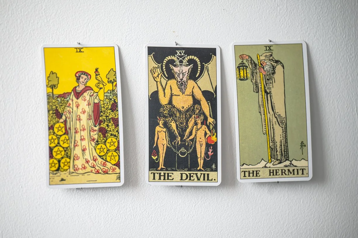 Three tarot cards displayed as part of Unweeded, a reading for Duncan Grant.