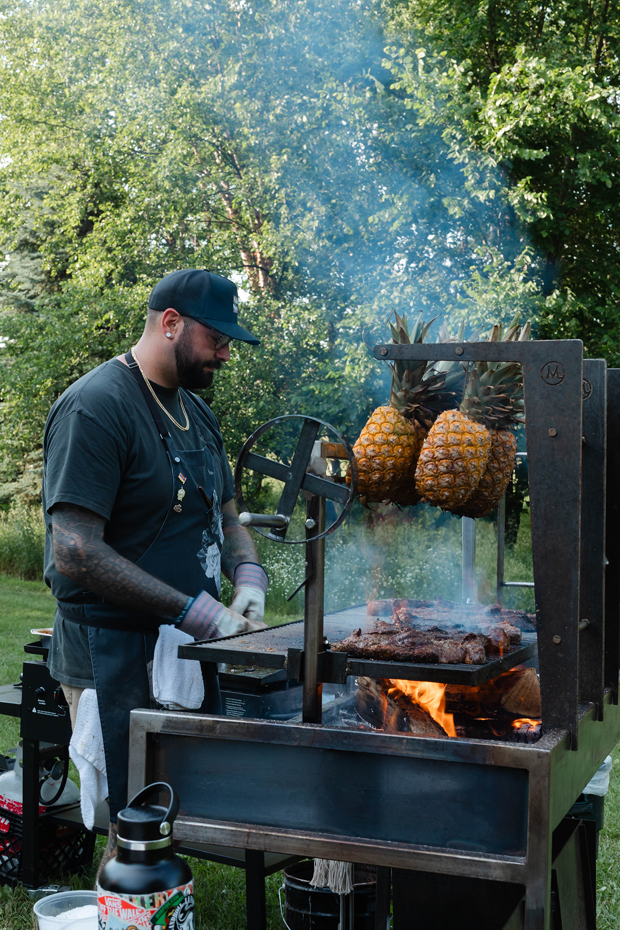 A chef live fire cooking.
