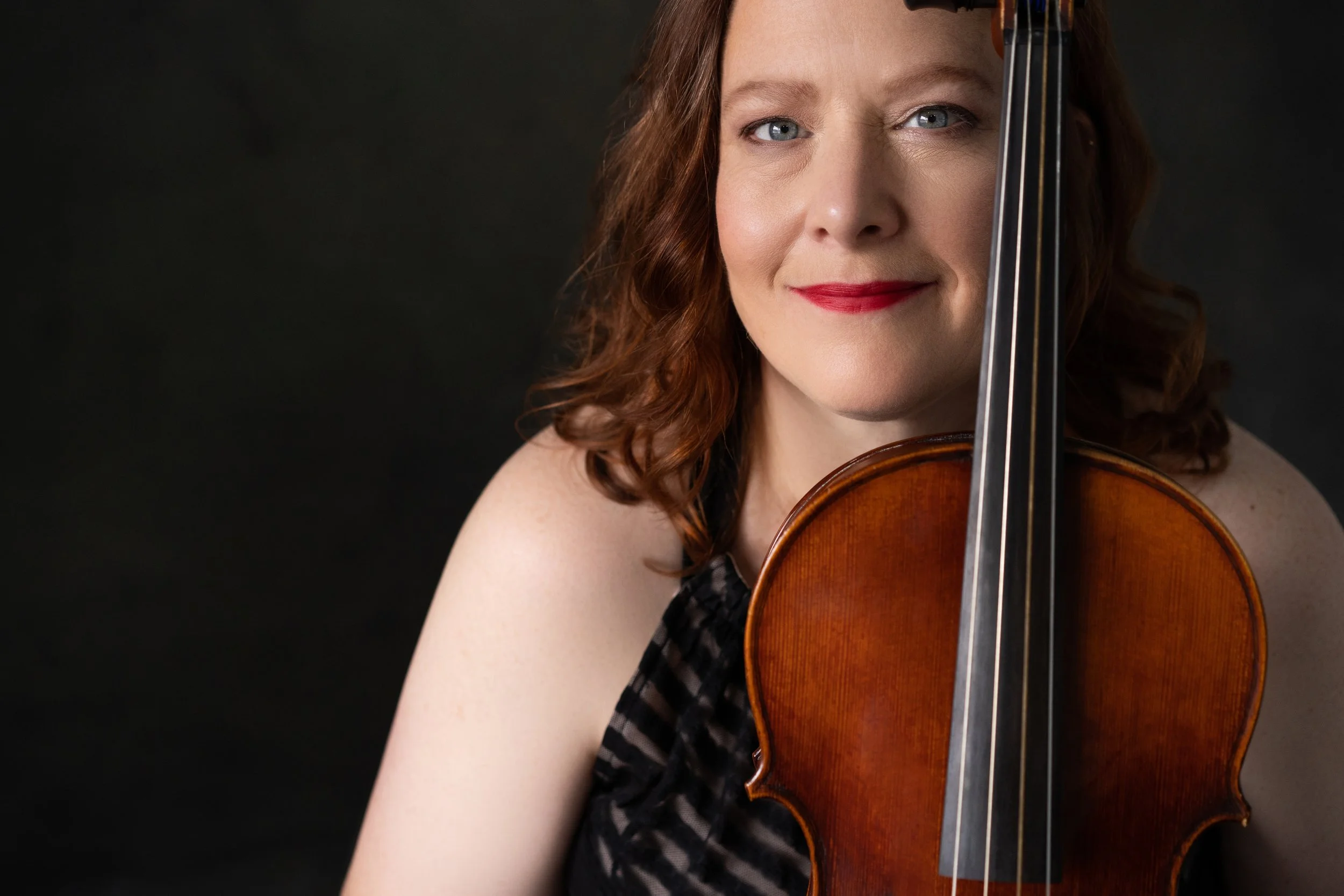Woman holding a viola