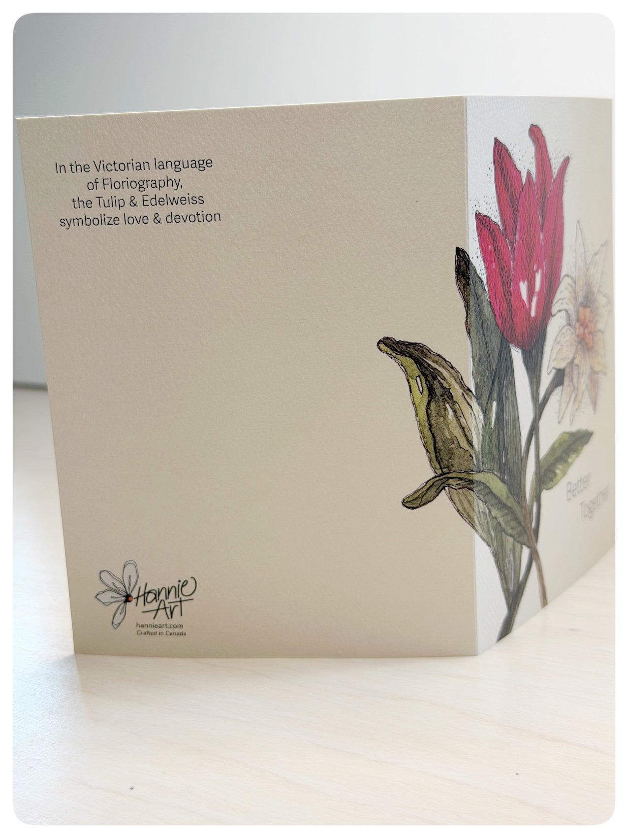 Side view of Better Together wedding and anniversary card showing wrap around tulip and edelweiss artwork