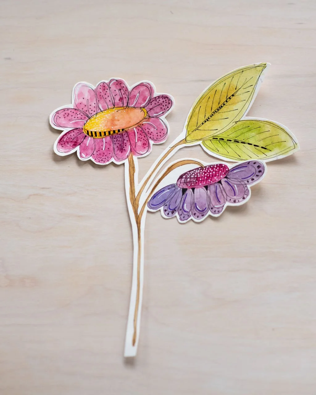 Joyful Whimsy watercolour floral place-setting decoration with pink and purple flowers and green leaves by Hannie Art Studio