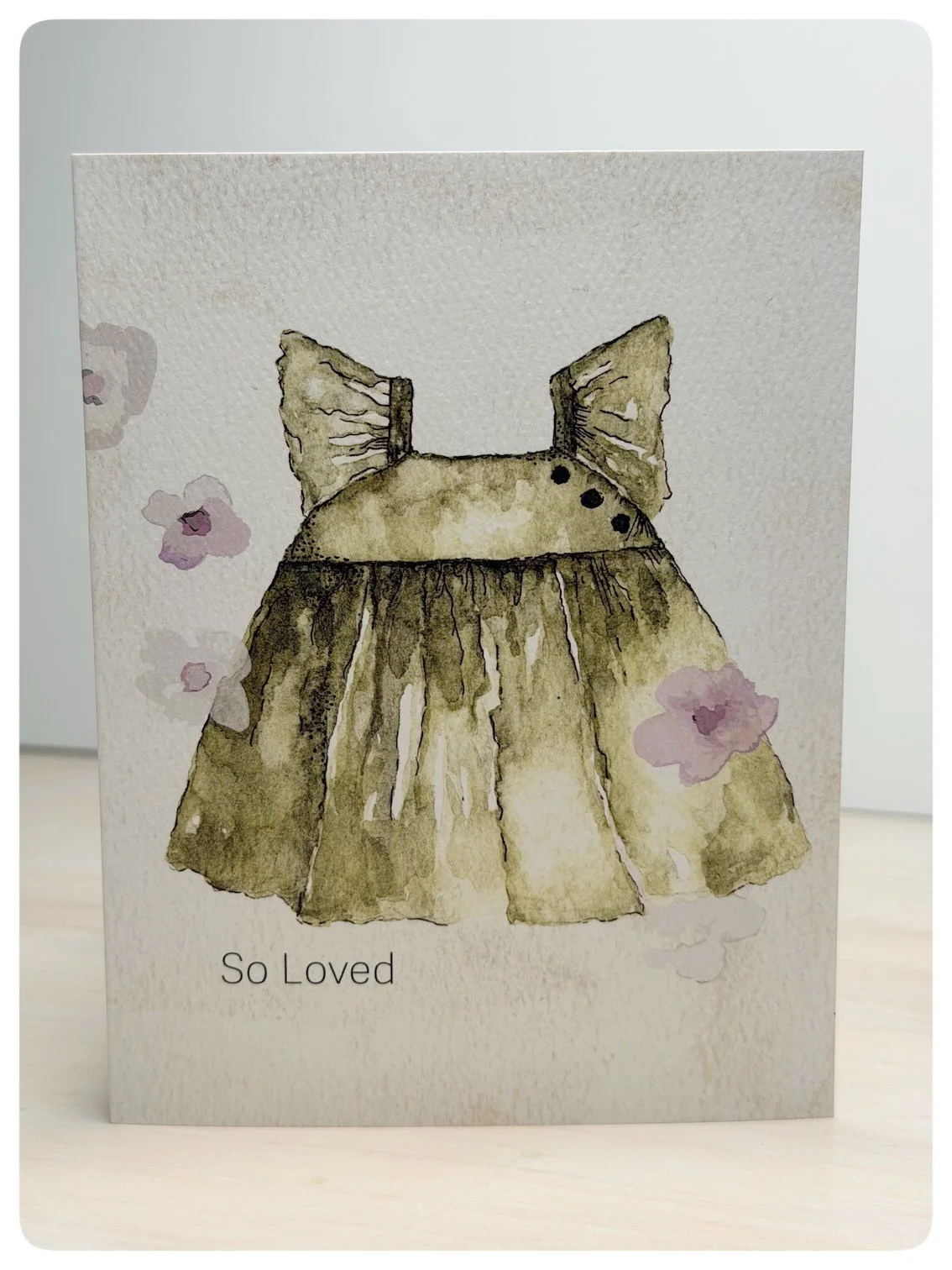 Baby girl pinafore greeting card with original watercolour floral artwork by Hannie Art