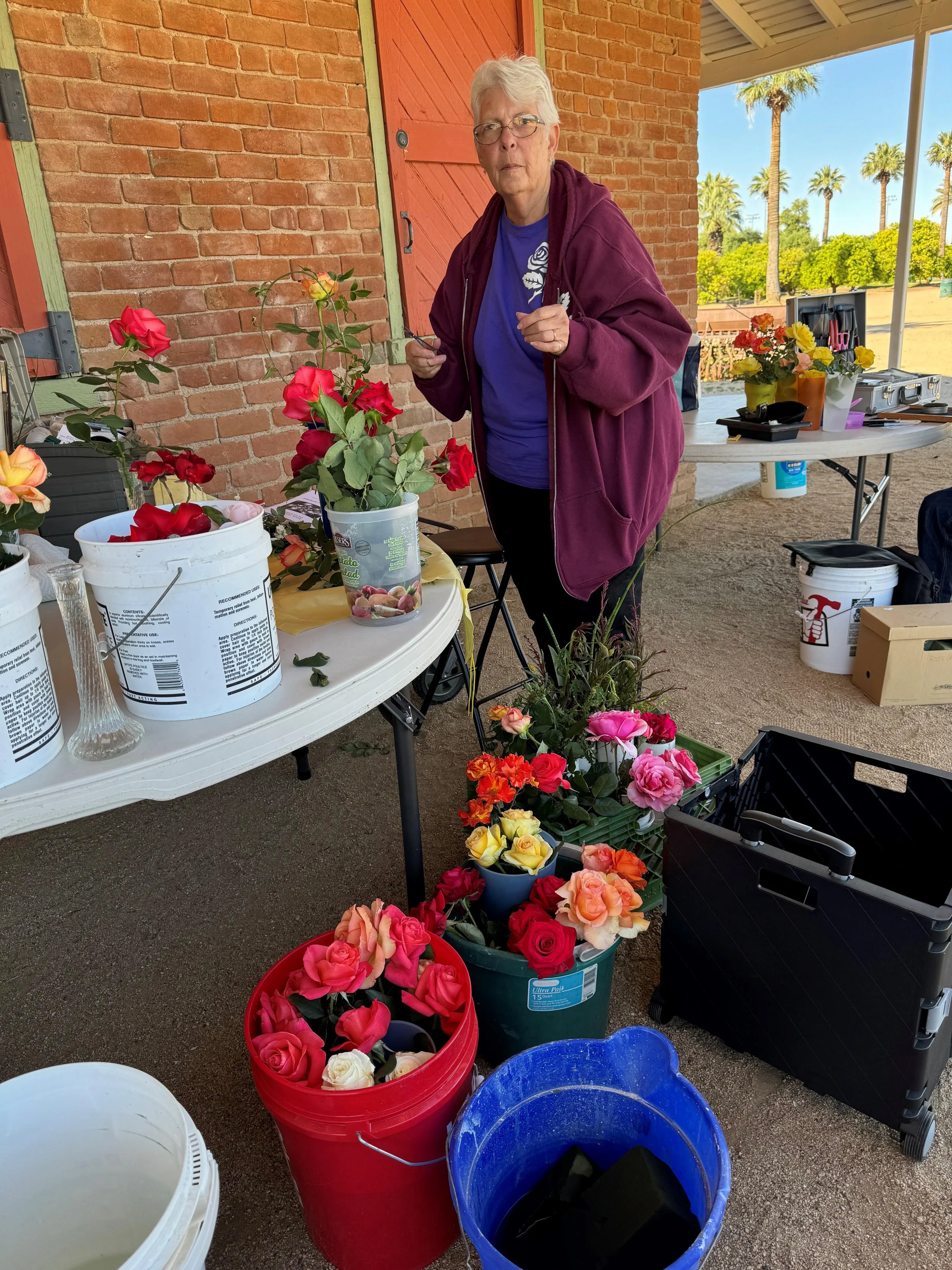 2024 Gerry M. With buckets of Roses.jpg
