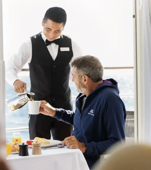 Crew delivering in-suite service