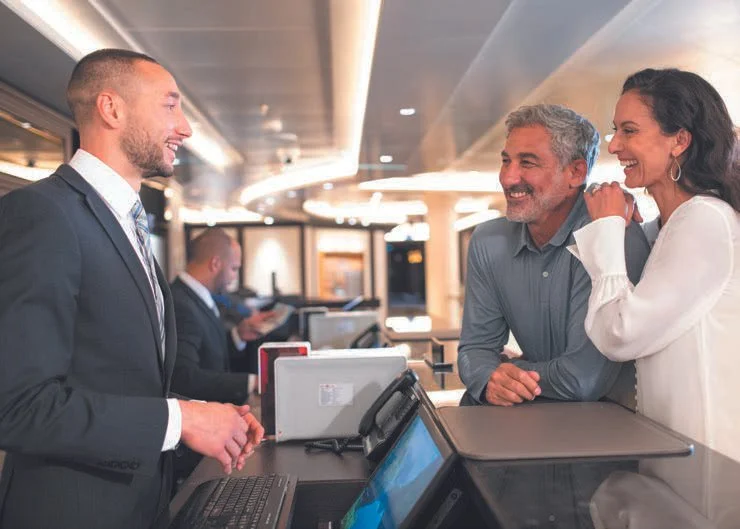 Guests checking in with concierge team