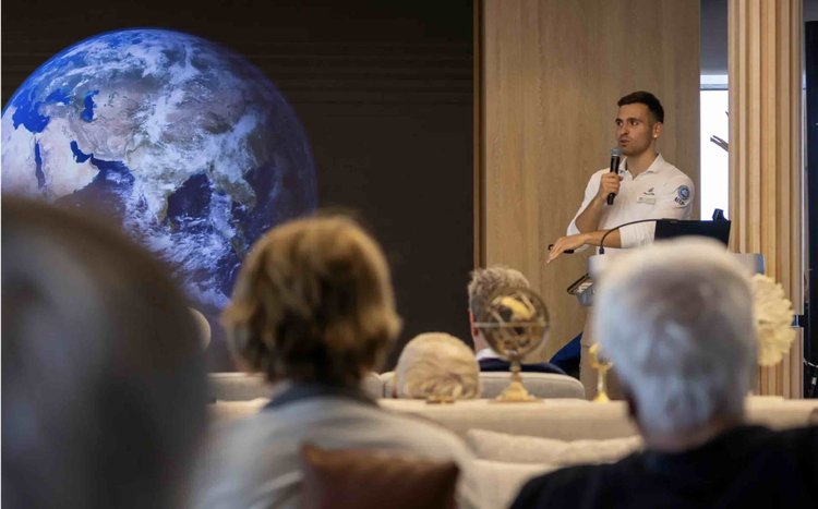Guests attending an onboard lecture