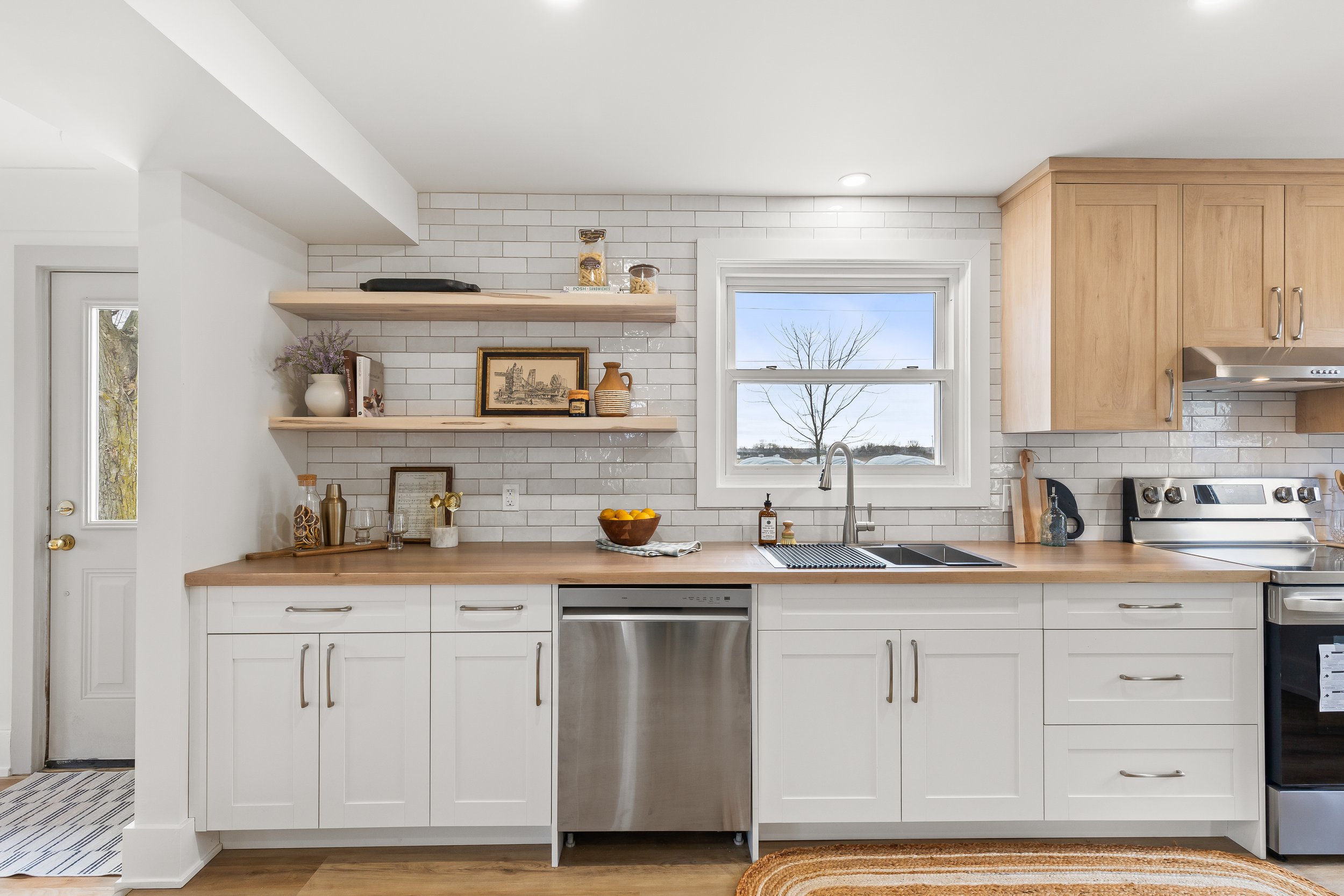 Modern Kitchen with Light Wood Countertops and Shelves