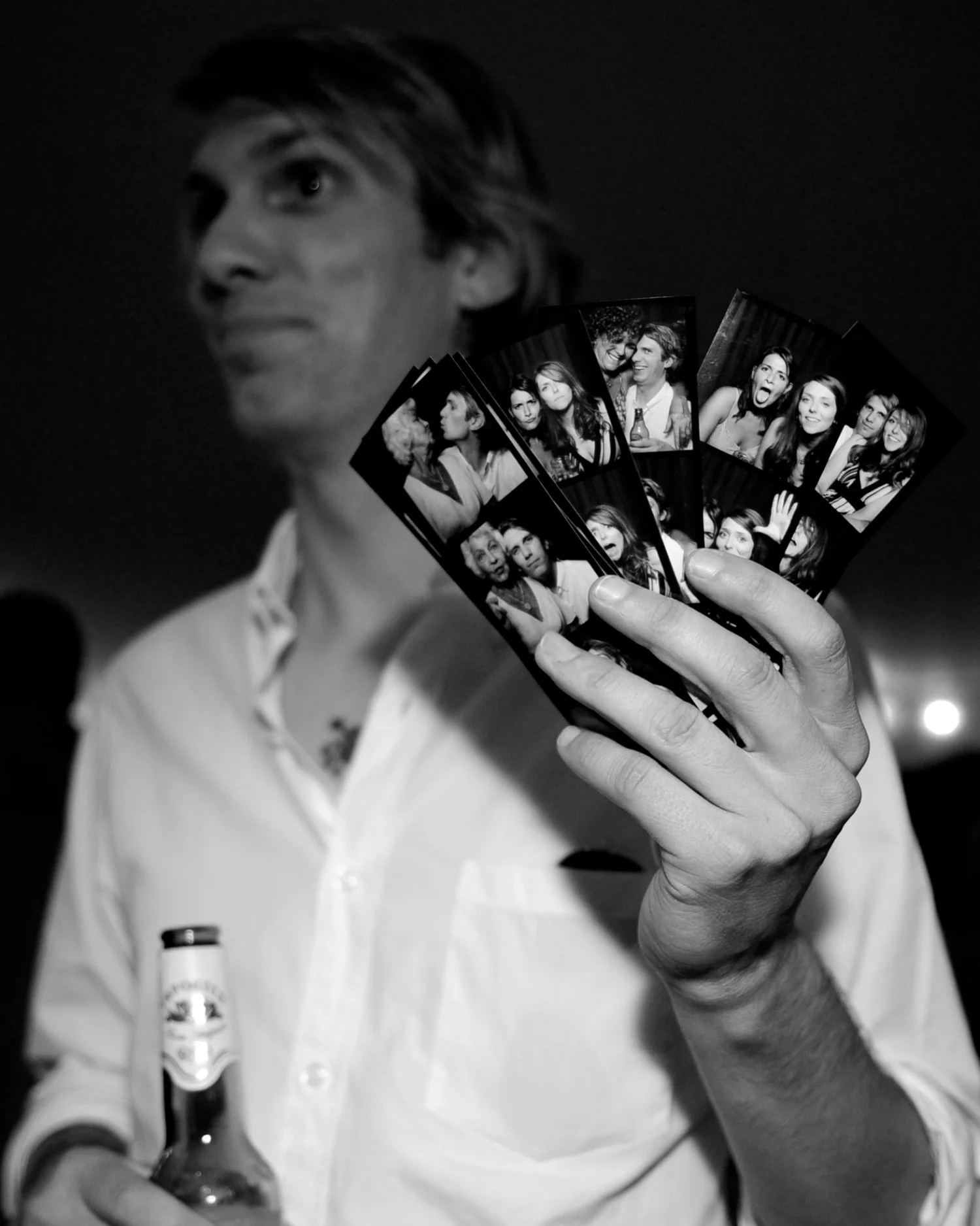 new york our goal: send your guests home with a fat stack of photo-strips black and white photo strips