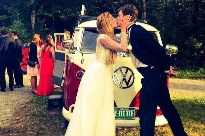 wedding photo booth with vintage VW bus at outdoor reception
