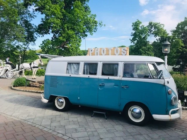 vintage VW van photo booth rental at outdoor wedding venue