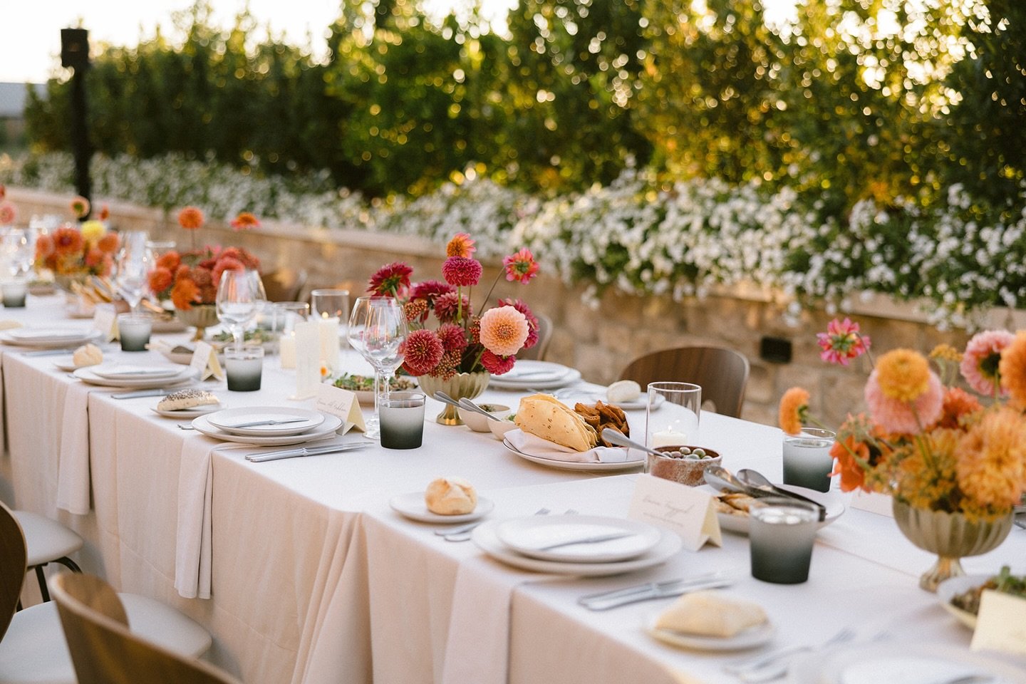 A single ingredient, thoughtfully composed. 

This arrangement is made entirely of dahlias&mdash;a peak-summer bloom celebrated for its structure, movement, and depth. By letting one seasonal flower take center stage, the design feels intentional and
