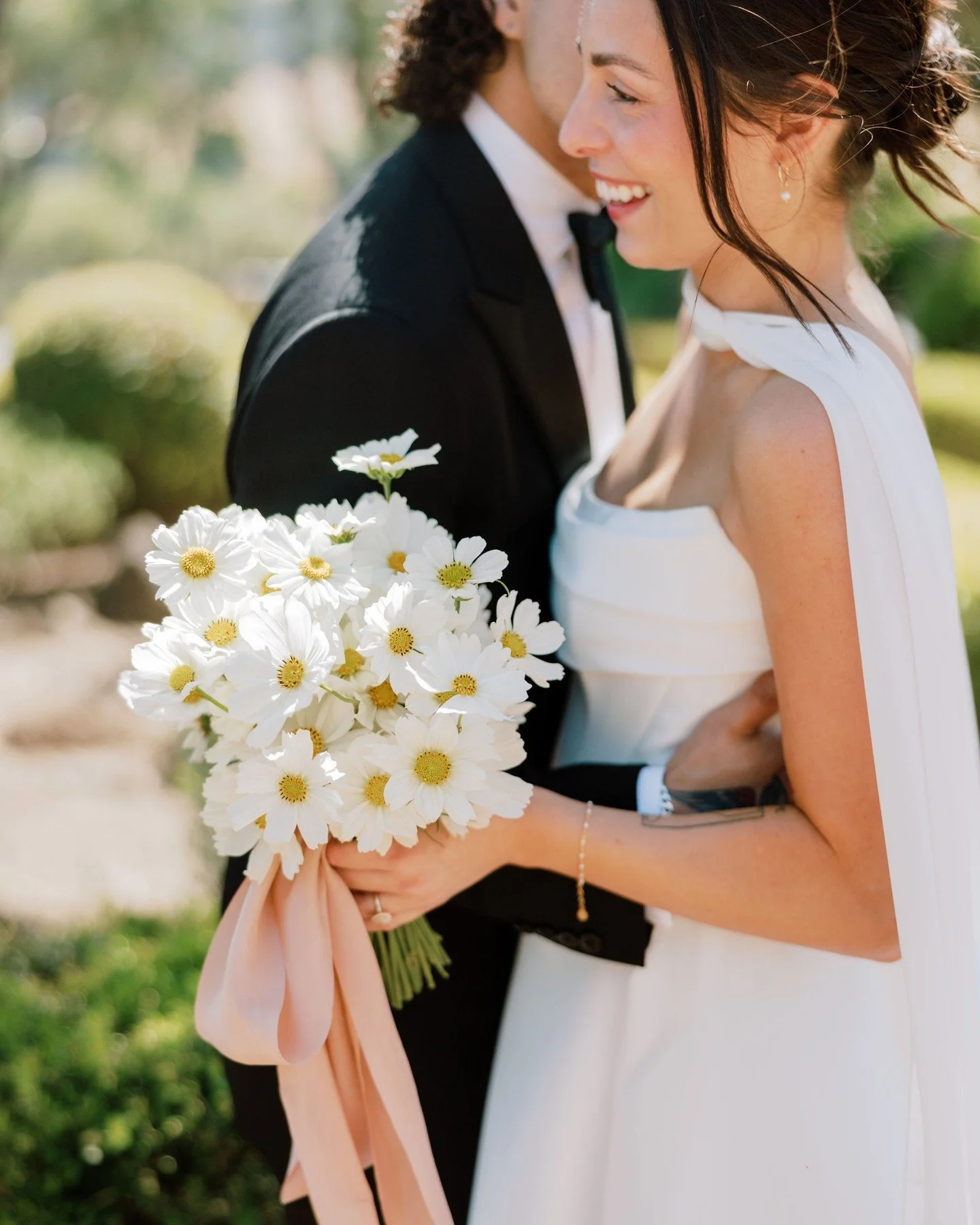 Save this for your wedding inspiration

Soft, effortless, and quietly striking&mdash;this all-white cosmos bouquet felt like summer light gathered in hand. Delicate petals, airy movement, and a kind of understated romance that doesn&rsquo;t ask for a