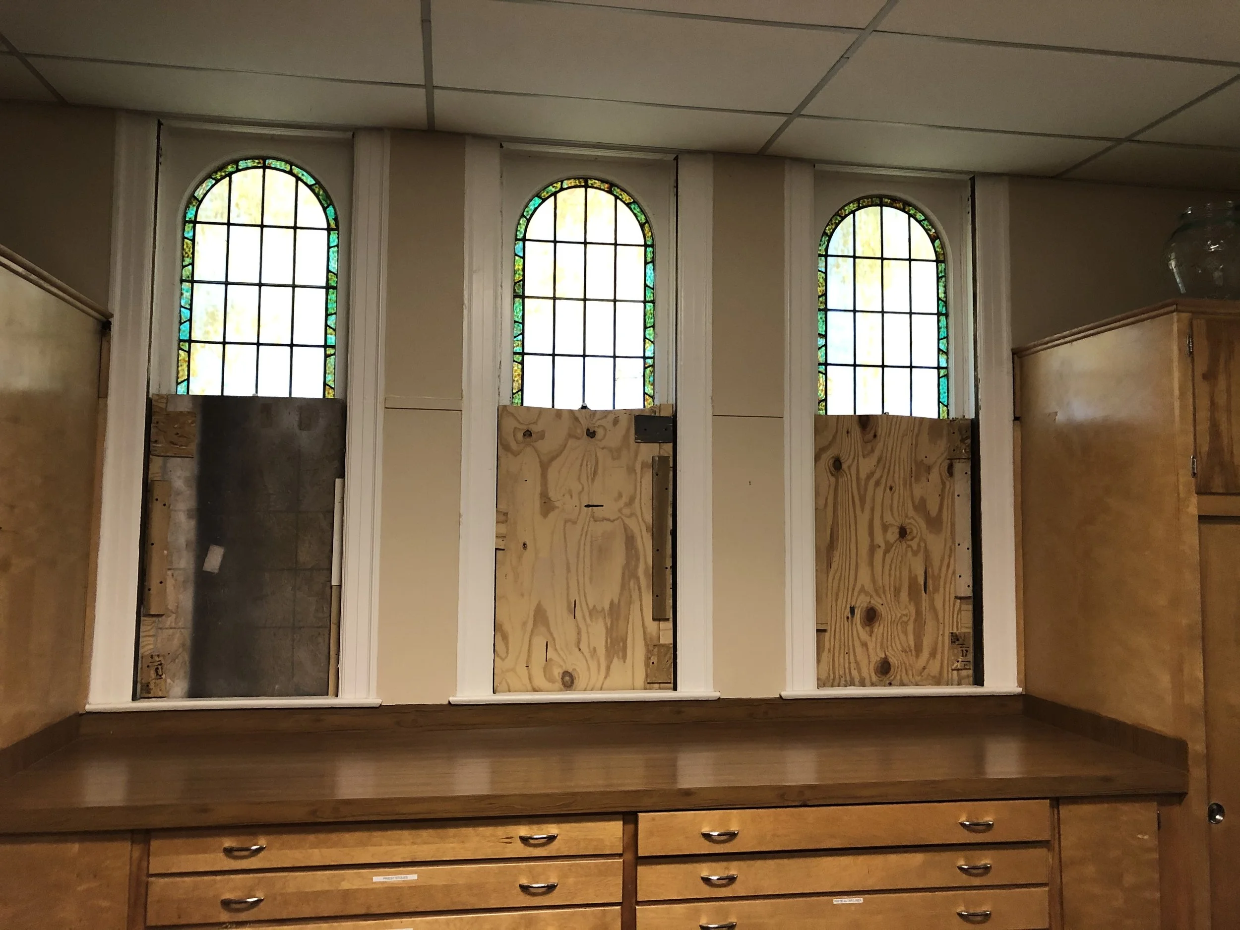 St. Francis stained glass window repair. Historical restoration by Custom Artisan Finishes in Omaha, Nebraska.