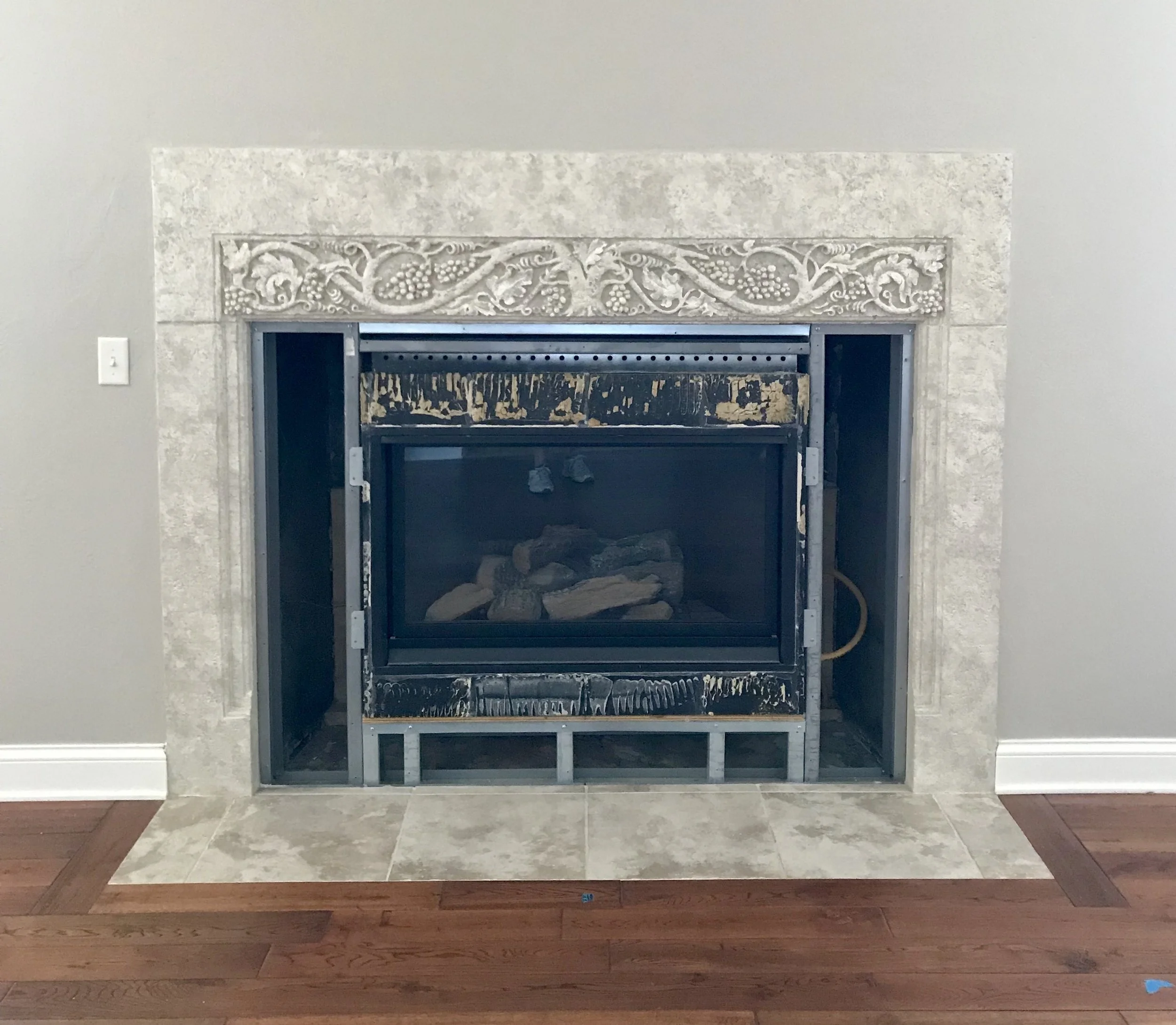 Residential fireplace finish by Custom Artisan Finishes in Omaha, Nebraska 