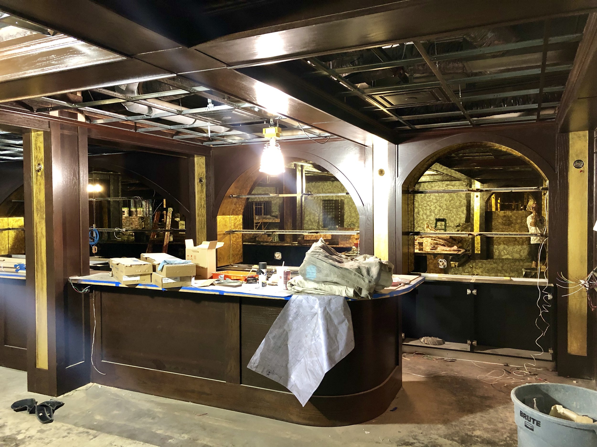 Wicked Rabbit and Alice Lounges commercial installation by Custom Artisan Finishes in Omaha, Nebraska. Commercial Restoration and Installation, gold leafing, gilding, masonry repair, by Custom Artisan Finishes in Omaha, Nebraska.