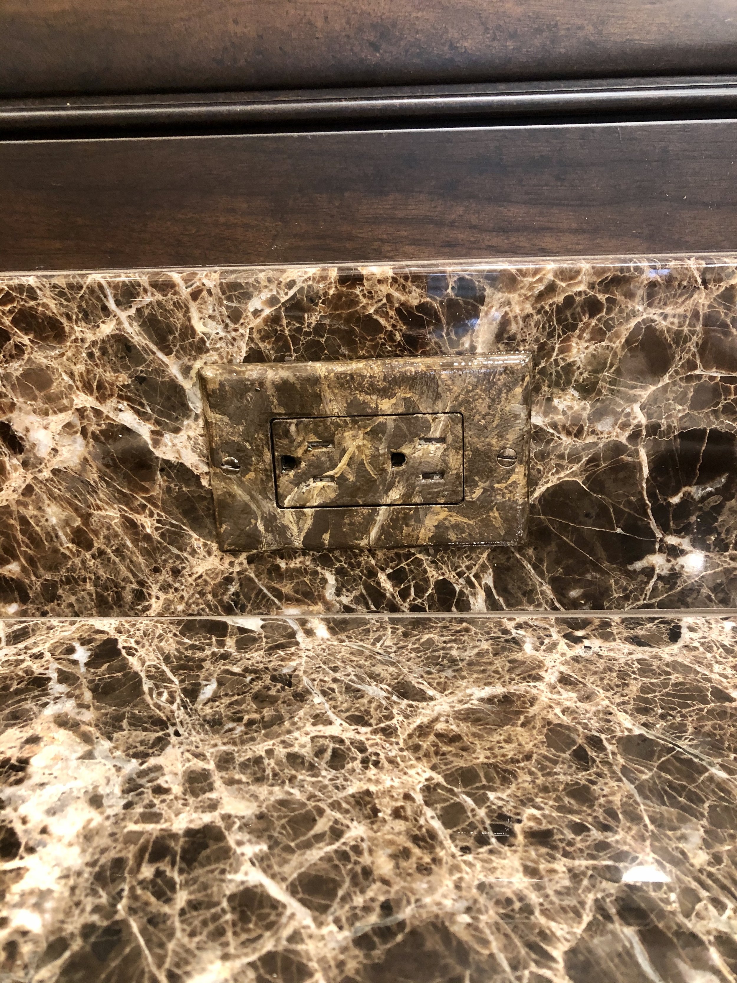 Hand Painted Outlet Covers by Custom Artisan Finishes 